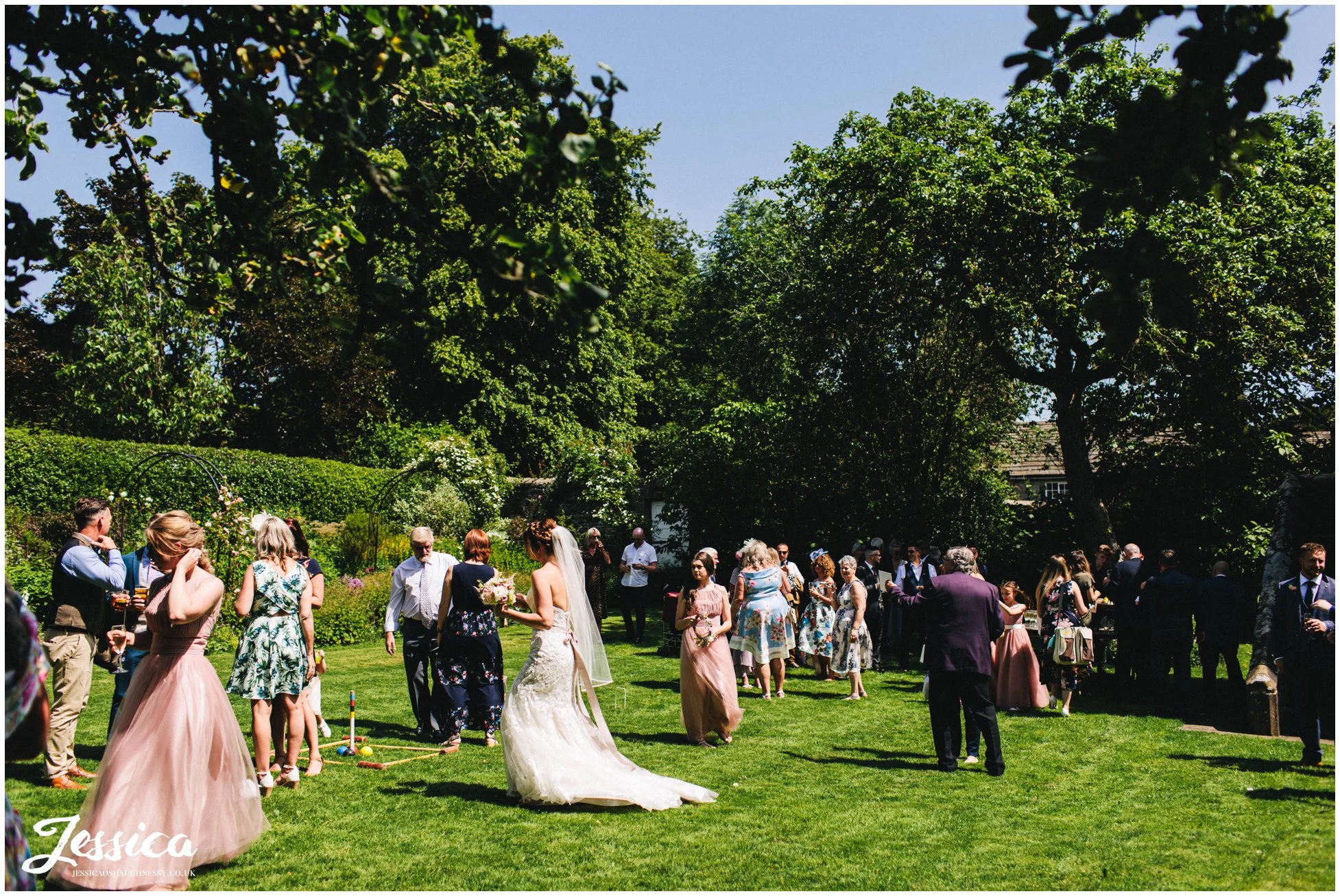 guests enjoy the sunshine with champagne & pimms