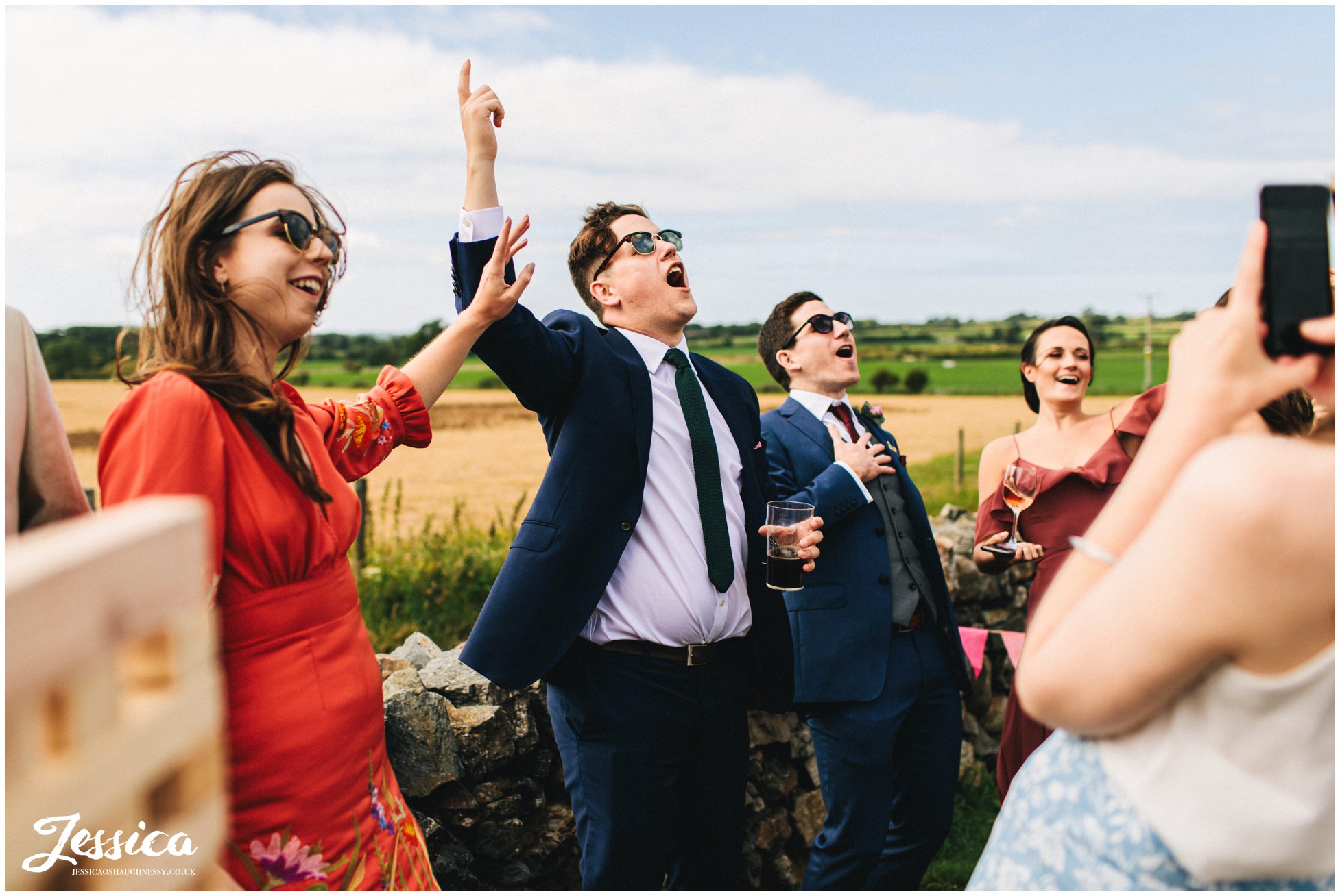 friends of the couple dance to the music