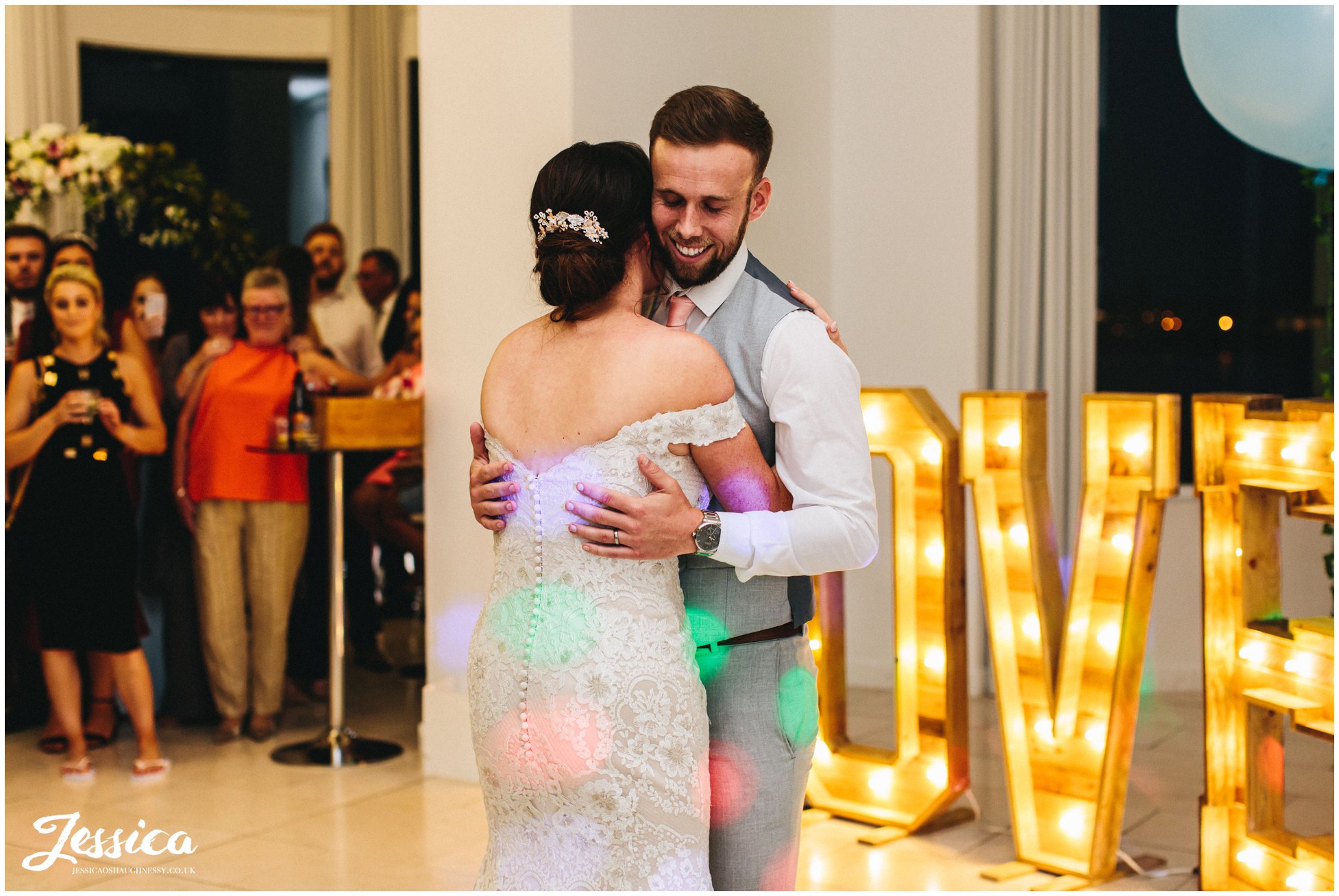 couple share their first dance together 