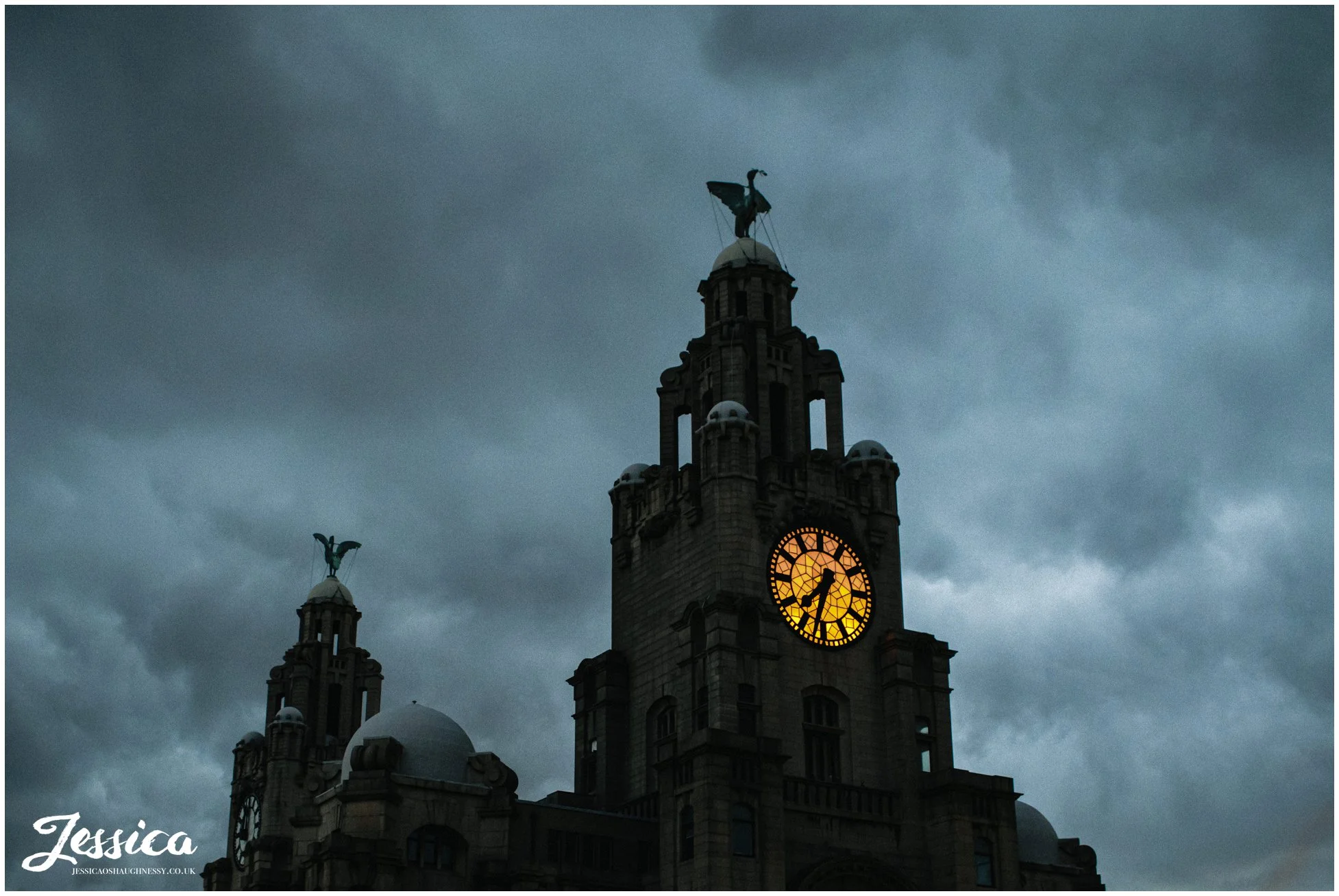 view of the liver building in liverpool at night