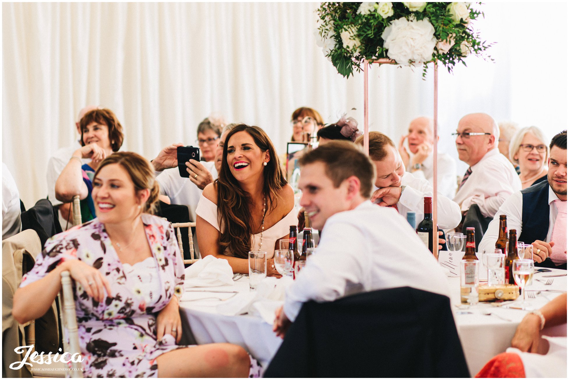 friends & family of the couple enjoy the speeches