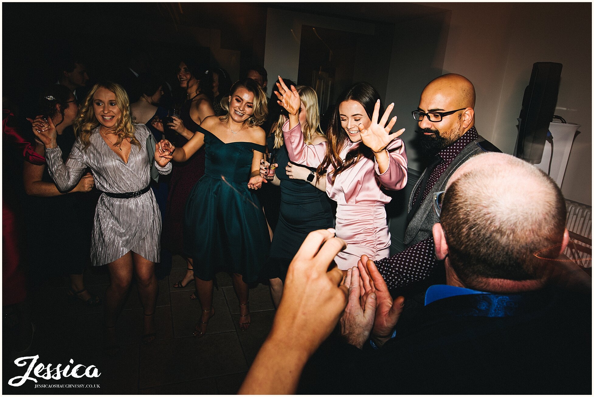 friends join the married couple on the dancefloor