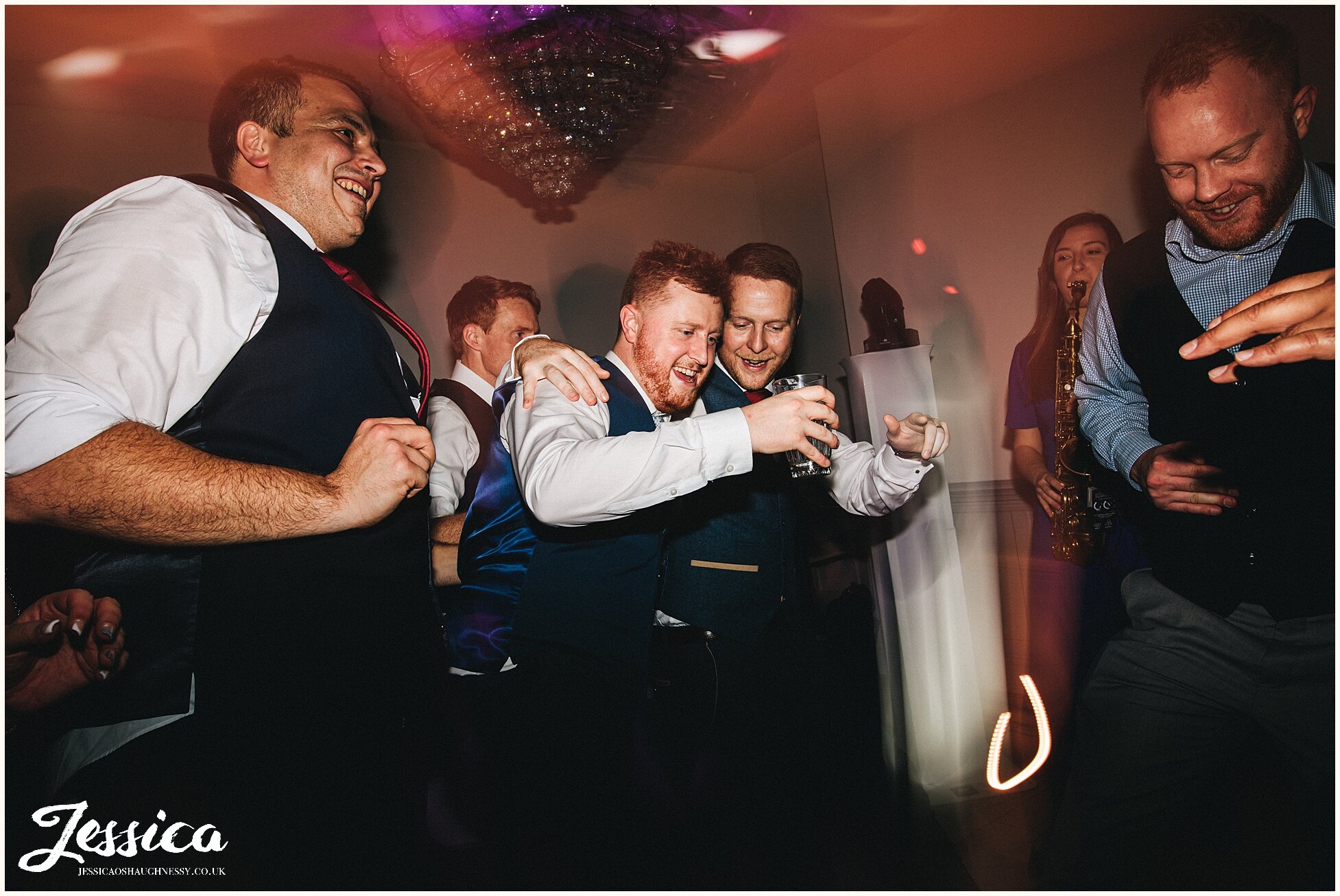 guests enjoy wedding reception at tyn dwr hall in north wales