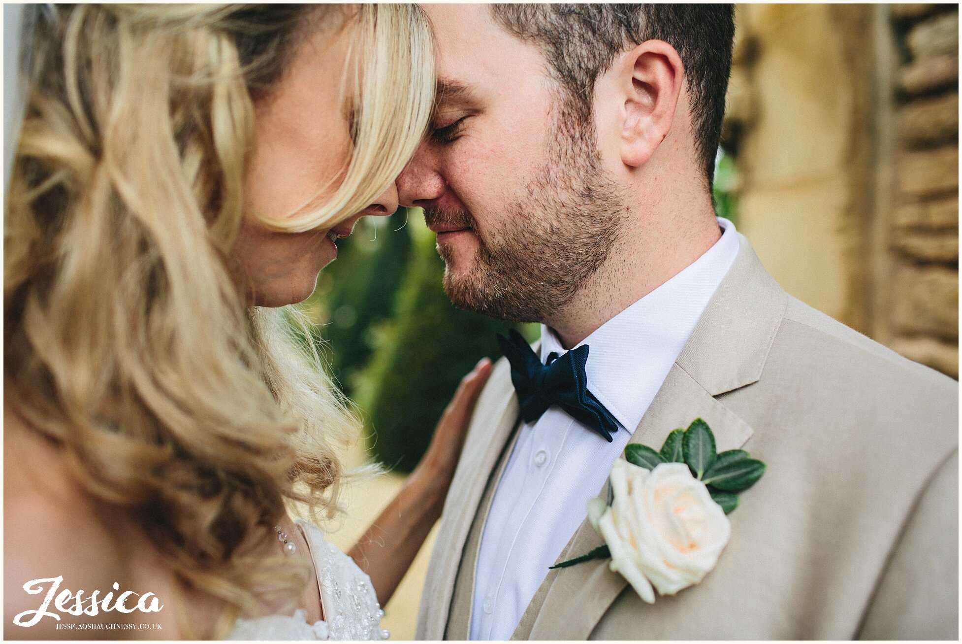 close up of groom with his bride - cotswolds wedding