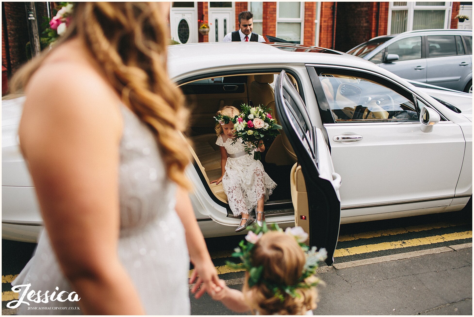 flower girl arrives at st. Anne's church in liverpool