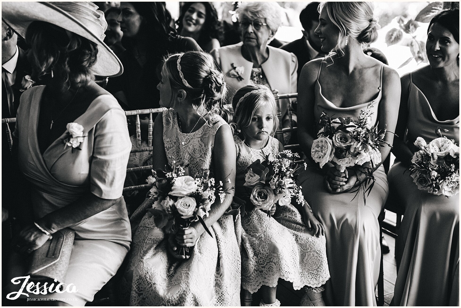 best man waits for his cue, holding the rings