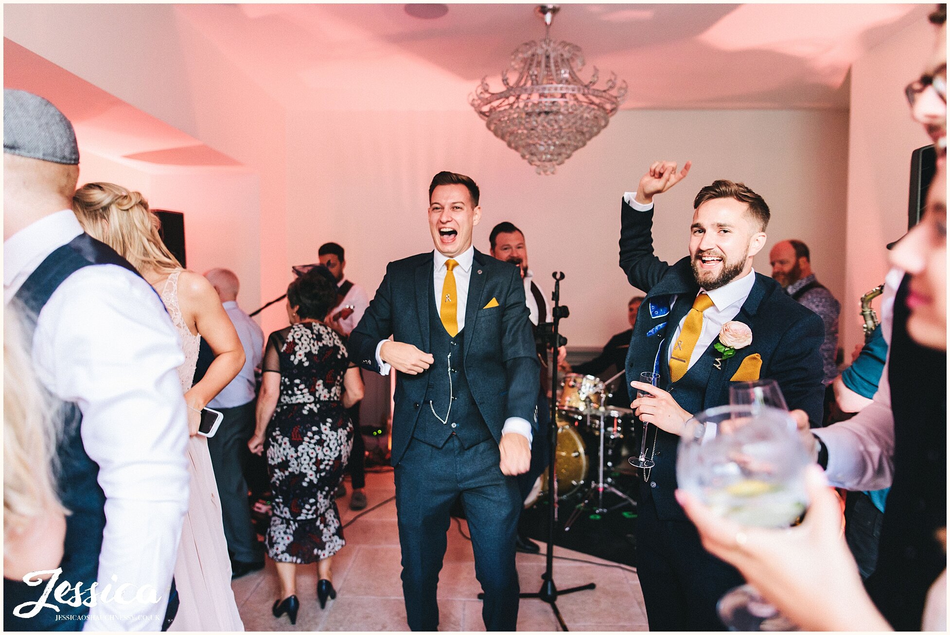 bride &amp; groom sing along to their wedding band