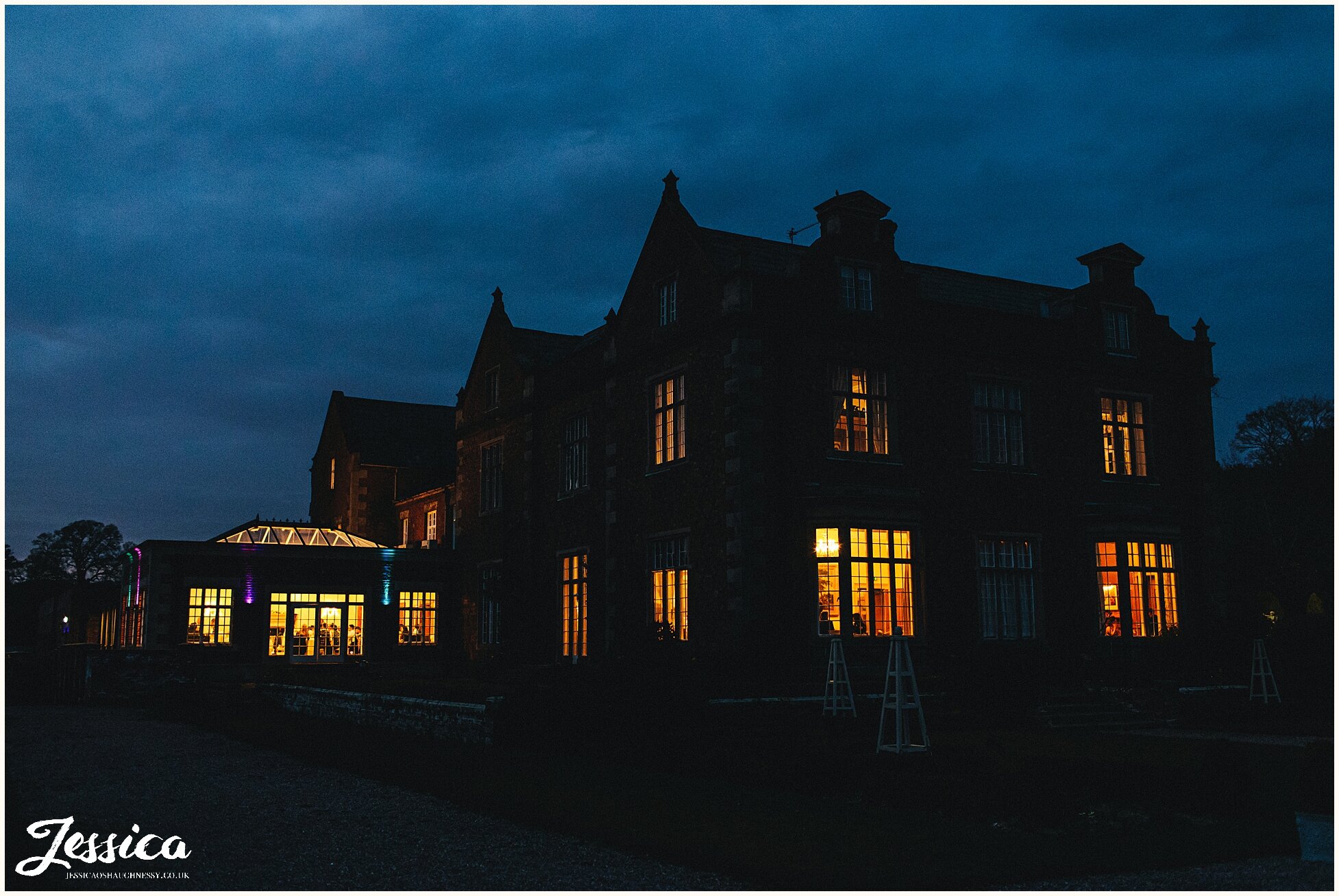 Willington Hall lit up at night as the celebrations continue