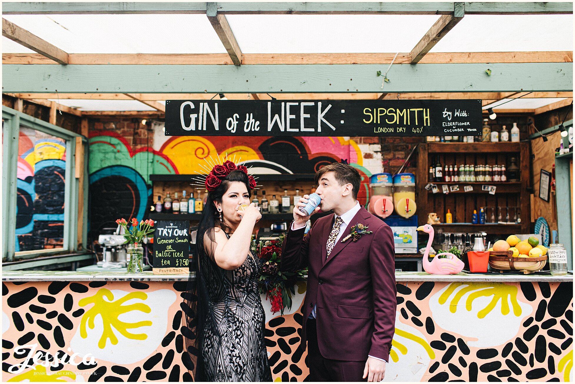 bride &amp; groom drink gin at the botanical garden in baltic triangle