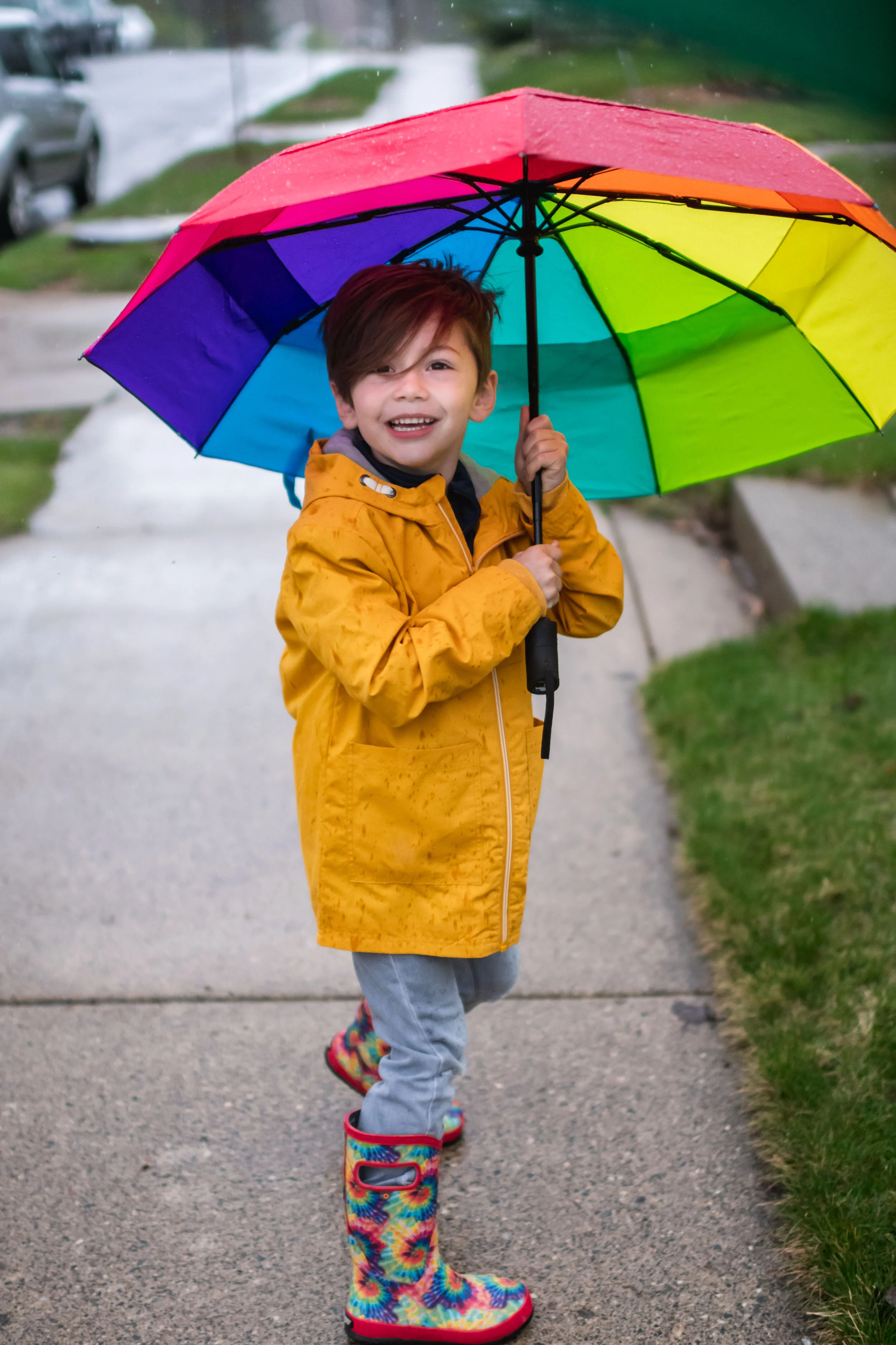 Minneapolis-documentary-family-photographer-playing-in-the-rain-042820-03.jpg