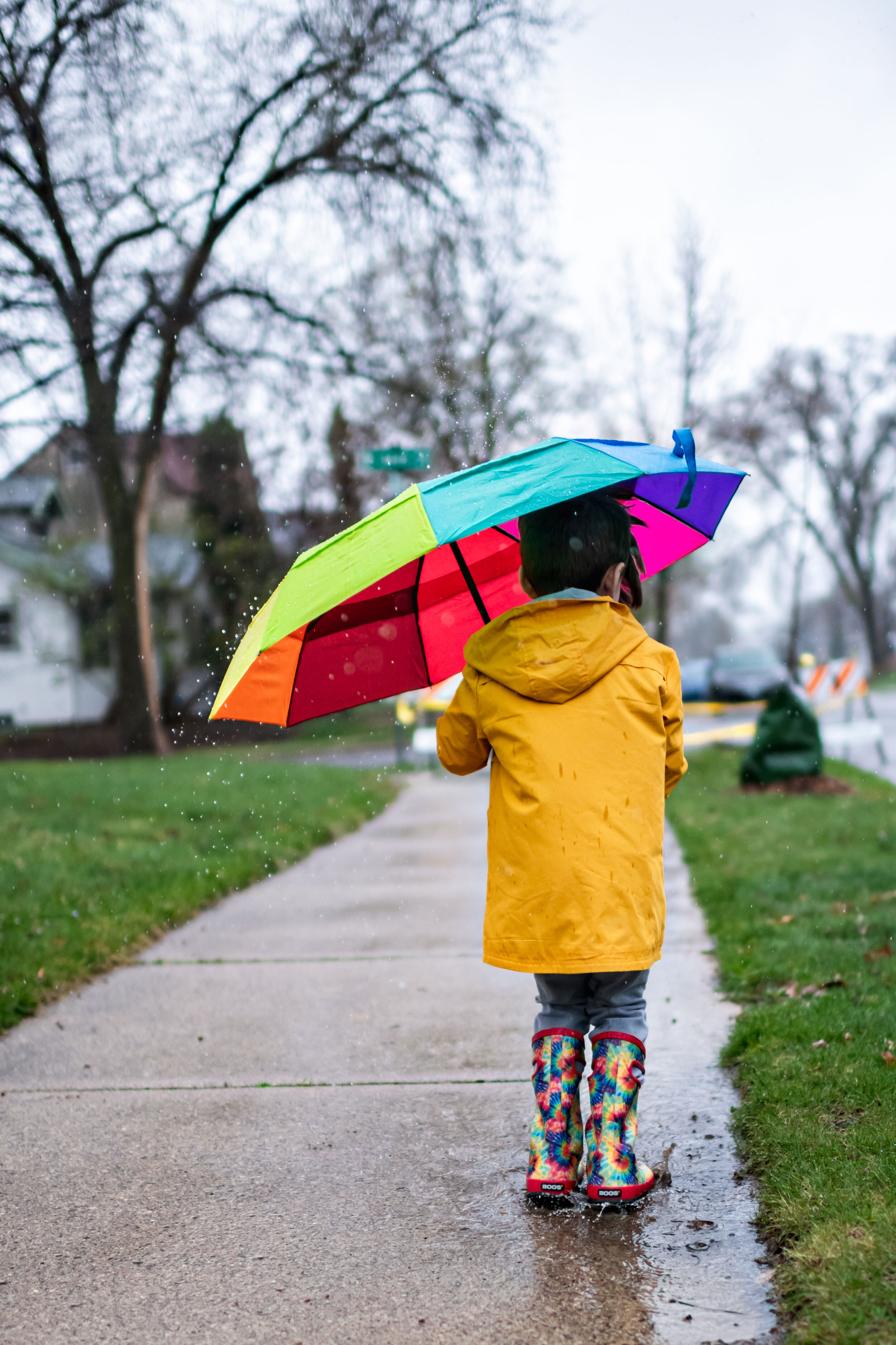 Minneapolis-documentary-family-photographer-playing-in-the-rain-042820-02.jpg