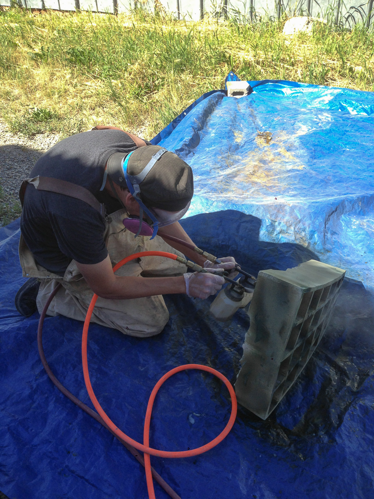 There's always someone in a frenzy of creation. Here's Peter Johnson, two spray guns blazing. 