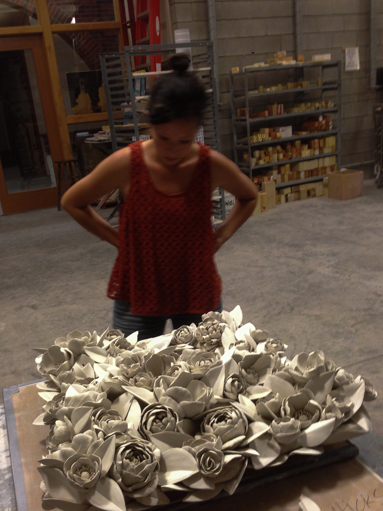 Here's Linda looking at one of Giselle Hicks' pieces that was about to go into the kiln. 