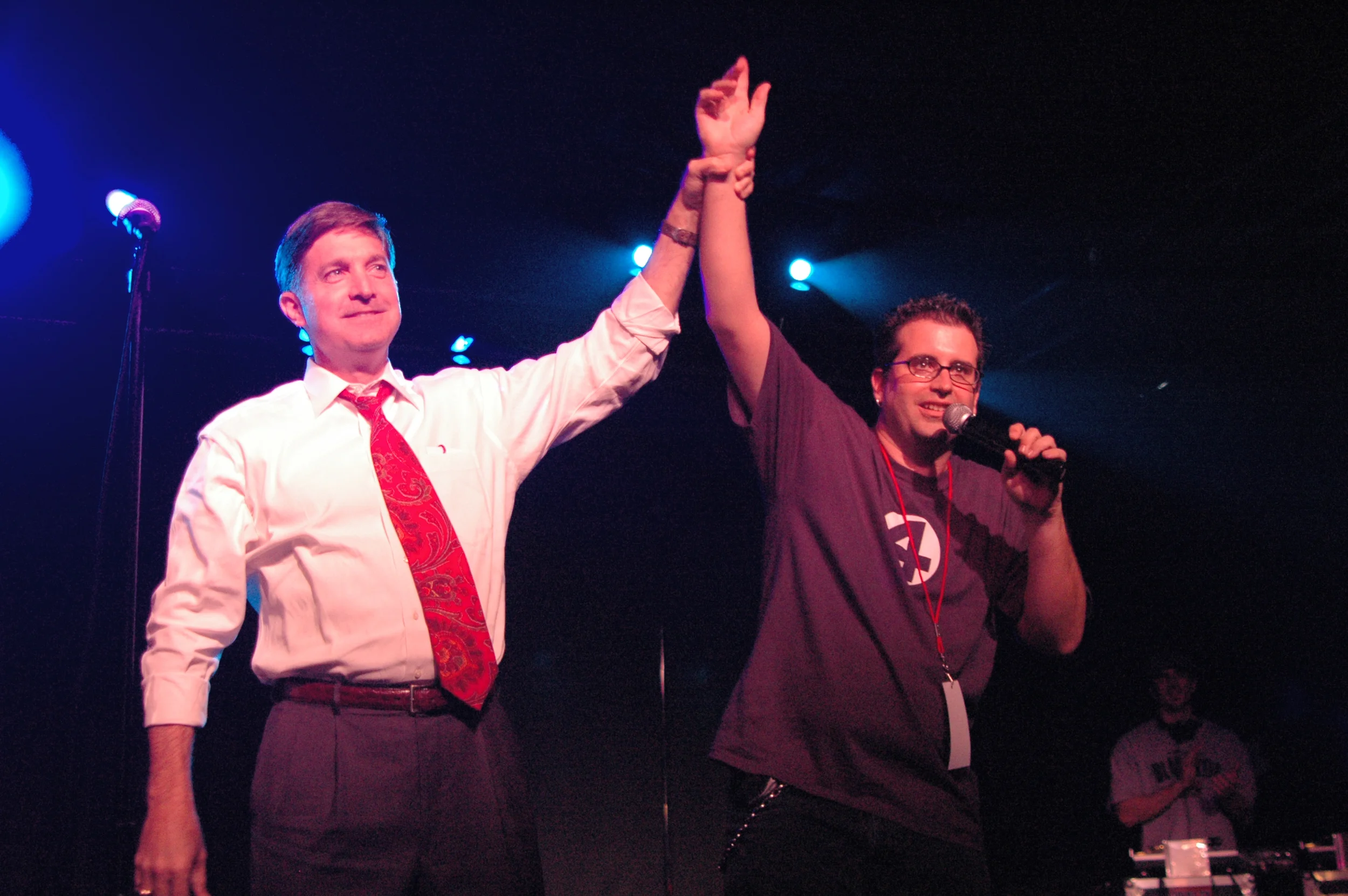 Austin Mayor Will Wynn and Mike Henry announce the upcoming 2006 National Poetry Slam, onstage at La Zona Rosa.