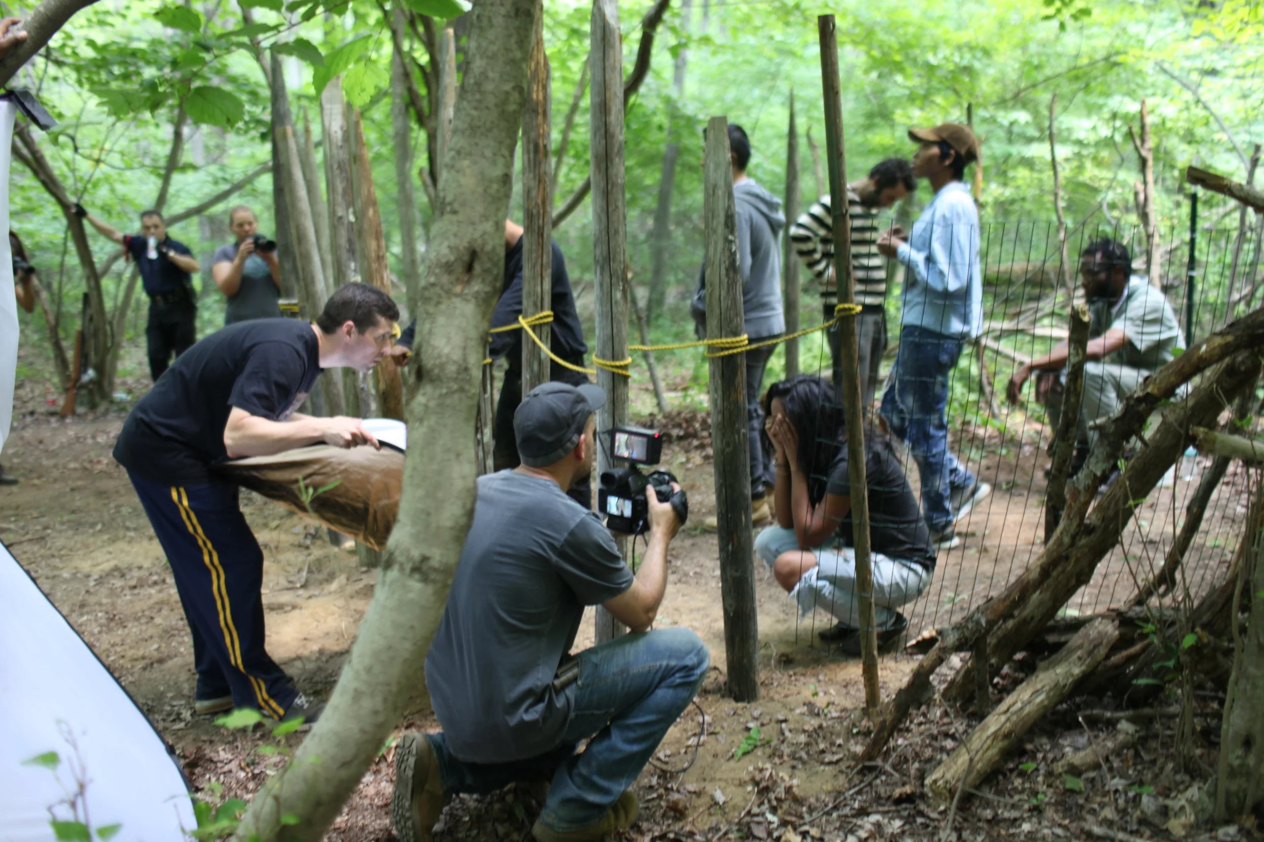 I go handheld here with the C100 Mark II. Ooh, check out that sweet prison we built.