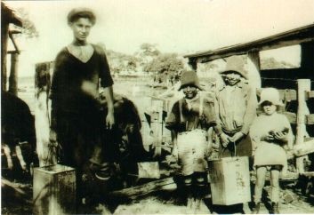 Johnstone family milking 1930