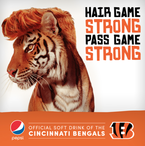  I don’t know why the Bengals never posted it because really what’s better than an actual tiger with Andy Dalton’s signature locks? 