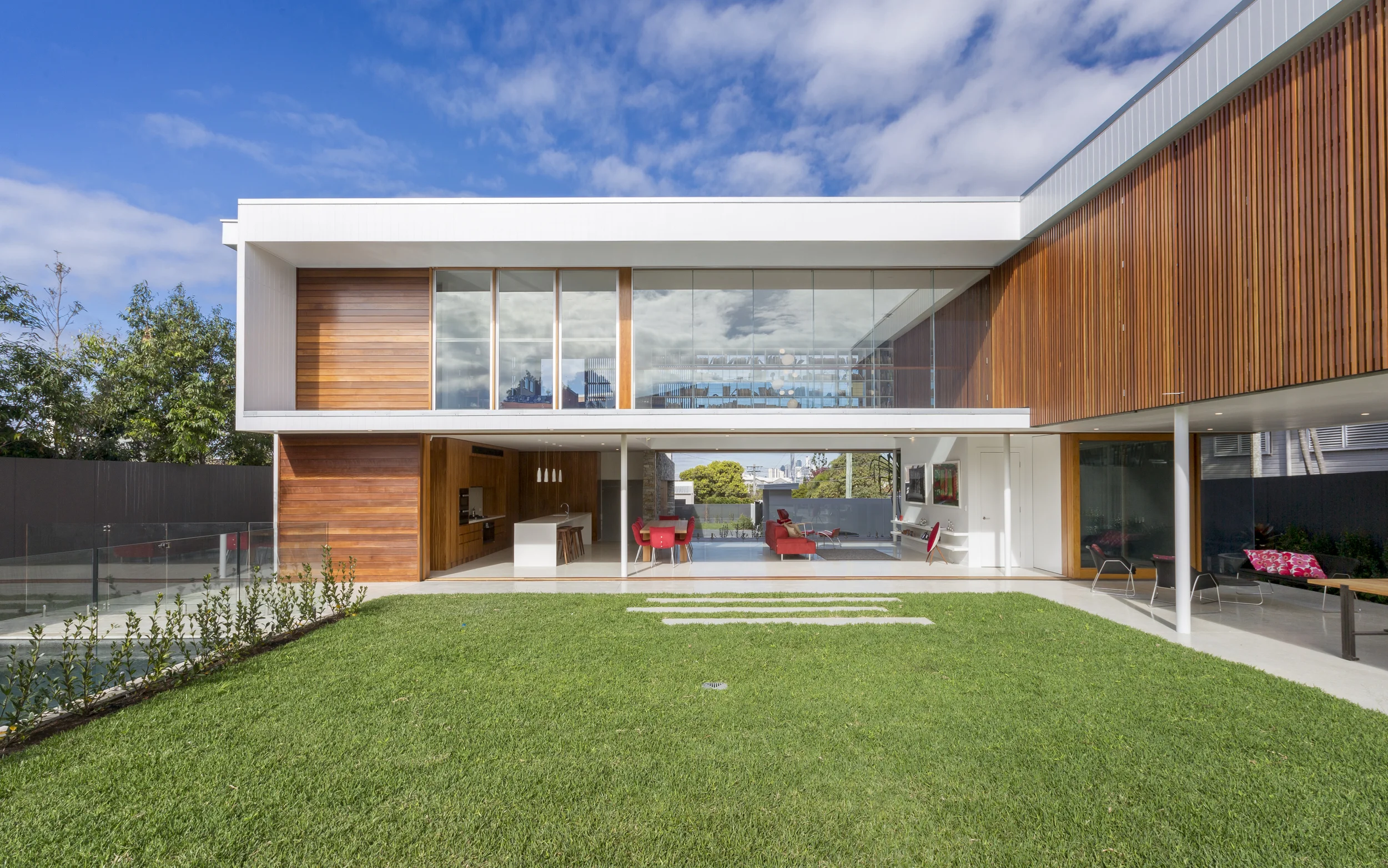  Open plan living and kitchen - architecture that transitions seamlessly into the landscape in Clayfield, Brisbane. 