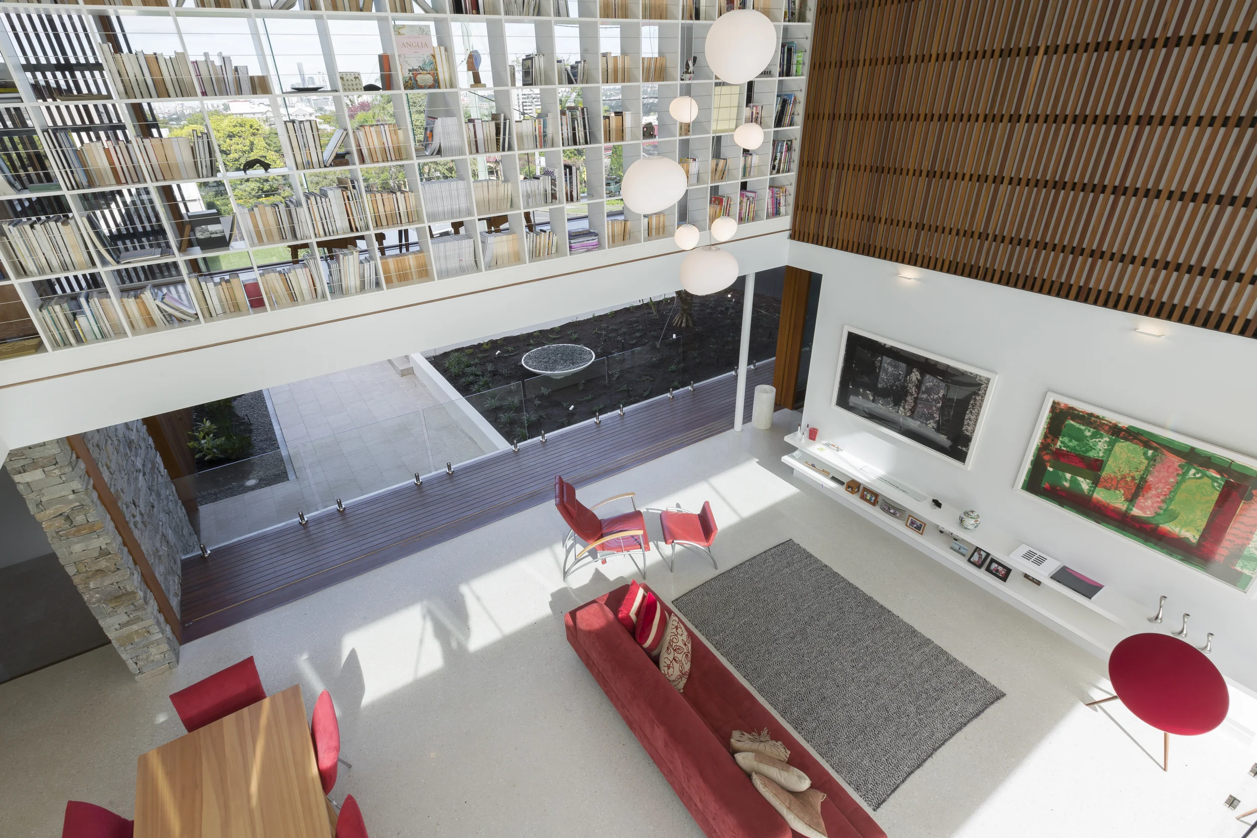  Open plan living and kitchen - architecture that transitions seamlessly into the landscape in Clayfield, Brisbane. 