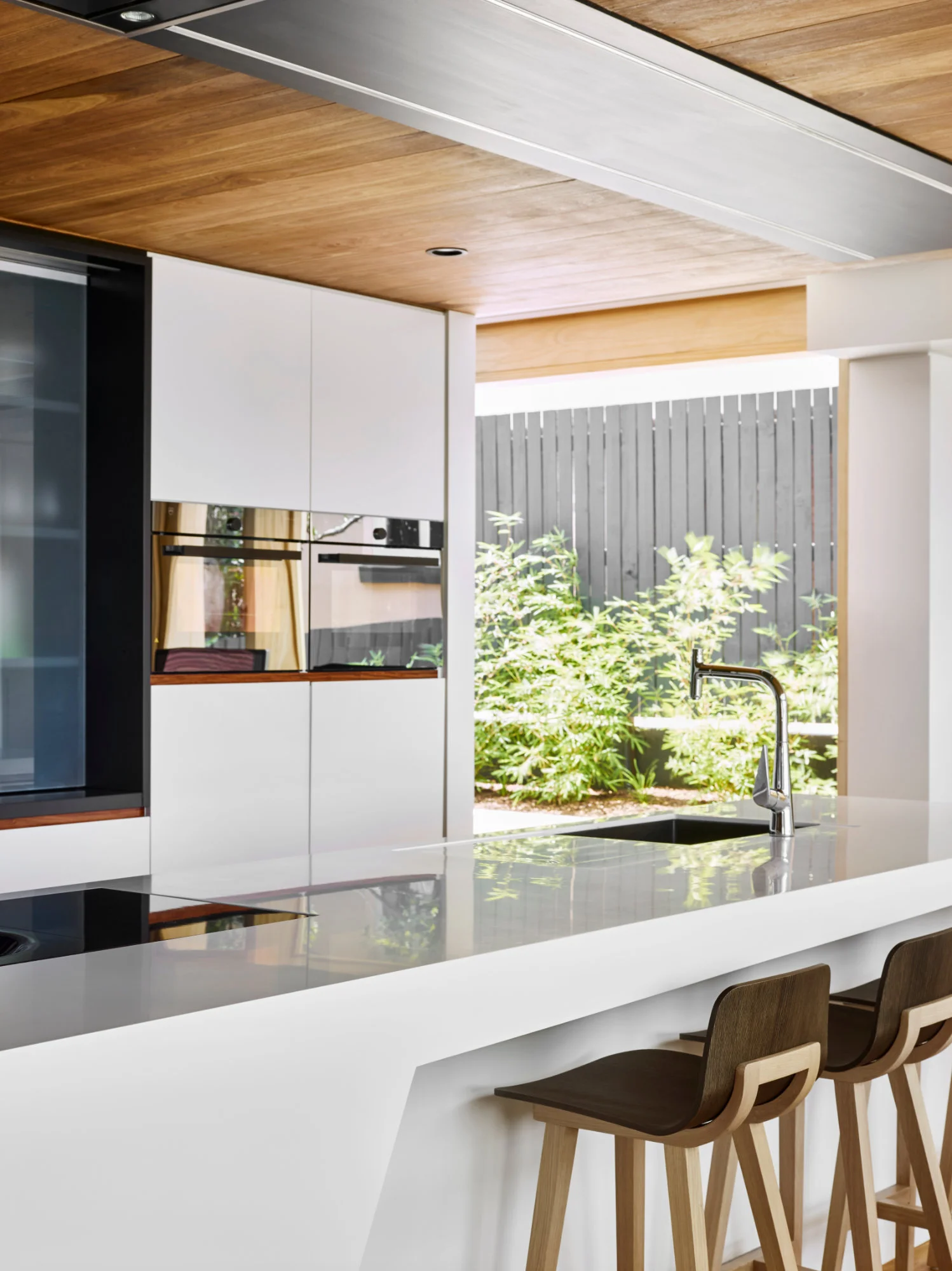  Modern kitchen architectural design featuring timber ceilings in New Farm, Brisbane.  