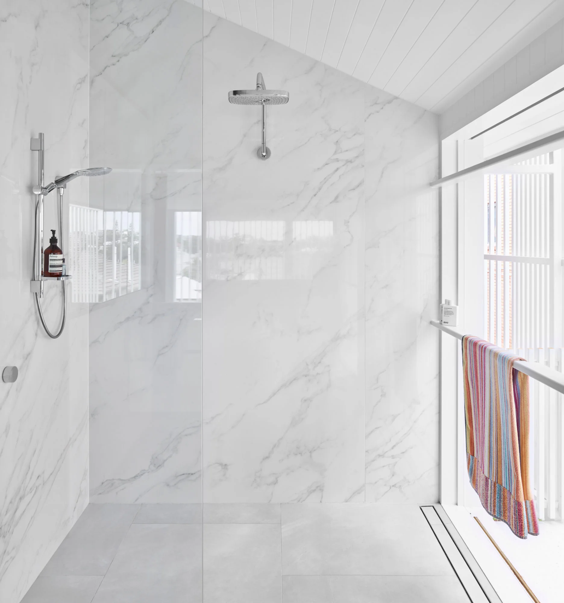  Architectural bathroom design with marble and timber features in New Farm, Brisbane. 
