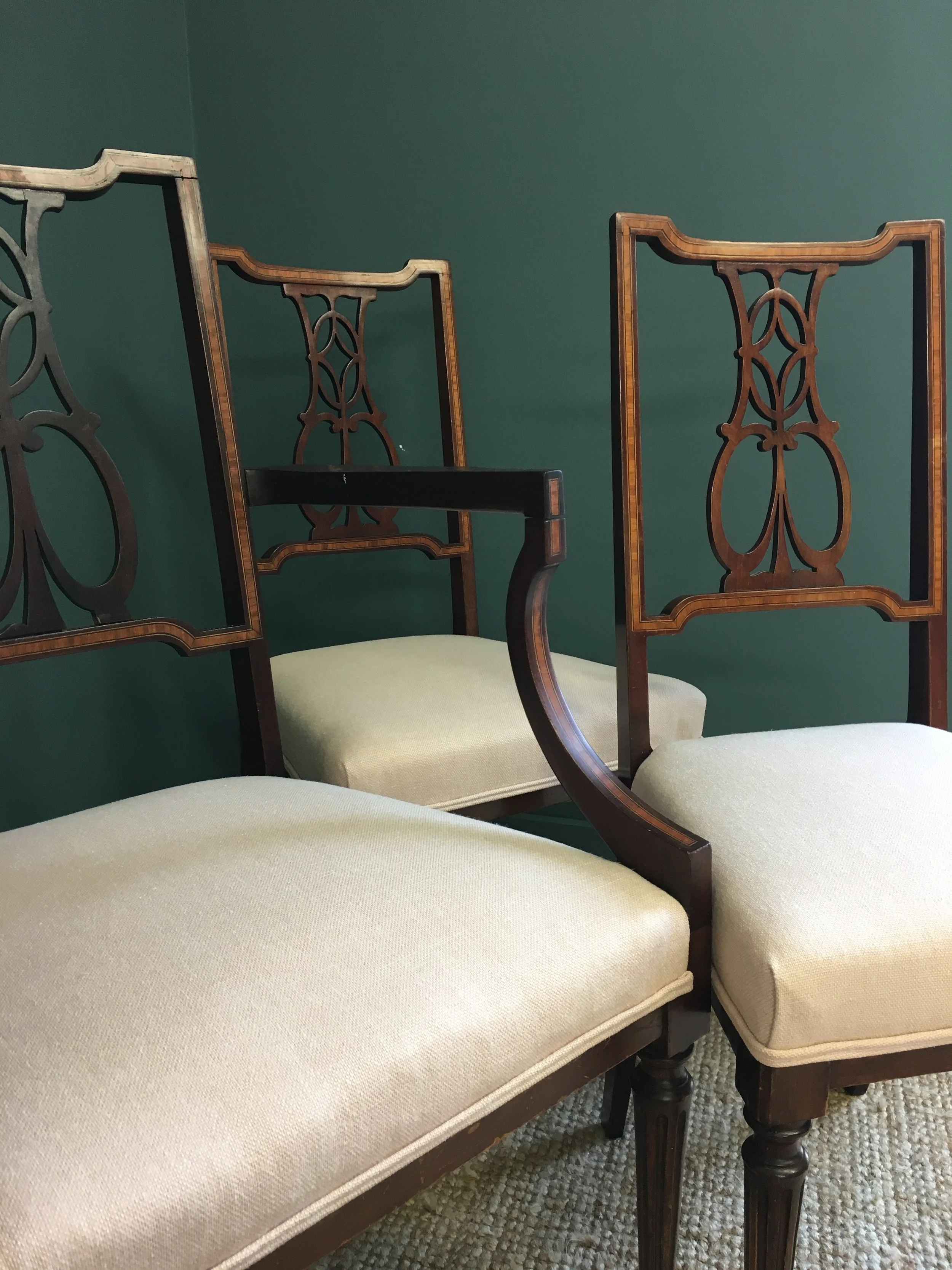 Dining chairs covered in pink linen purchased in a market in south of France