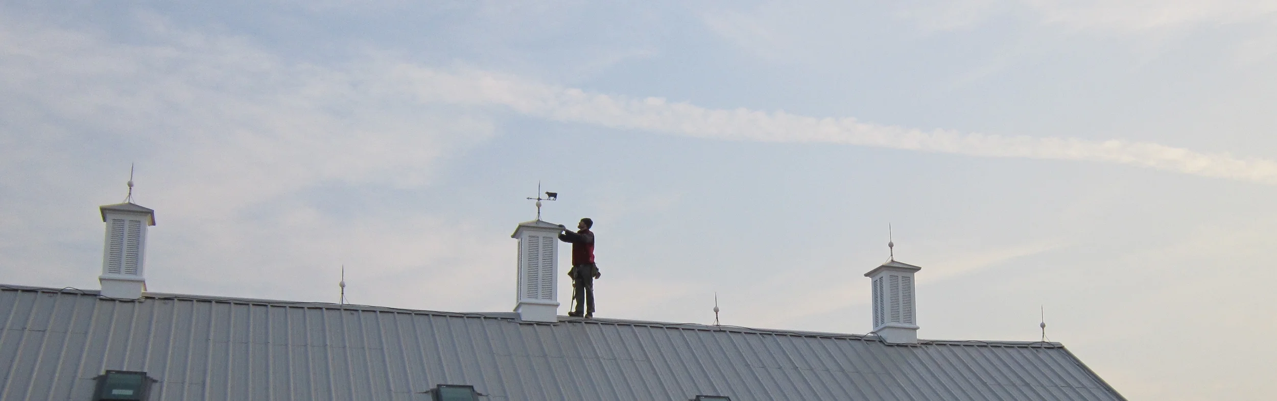New cupolas with original restored weather vane.