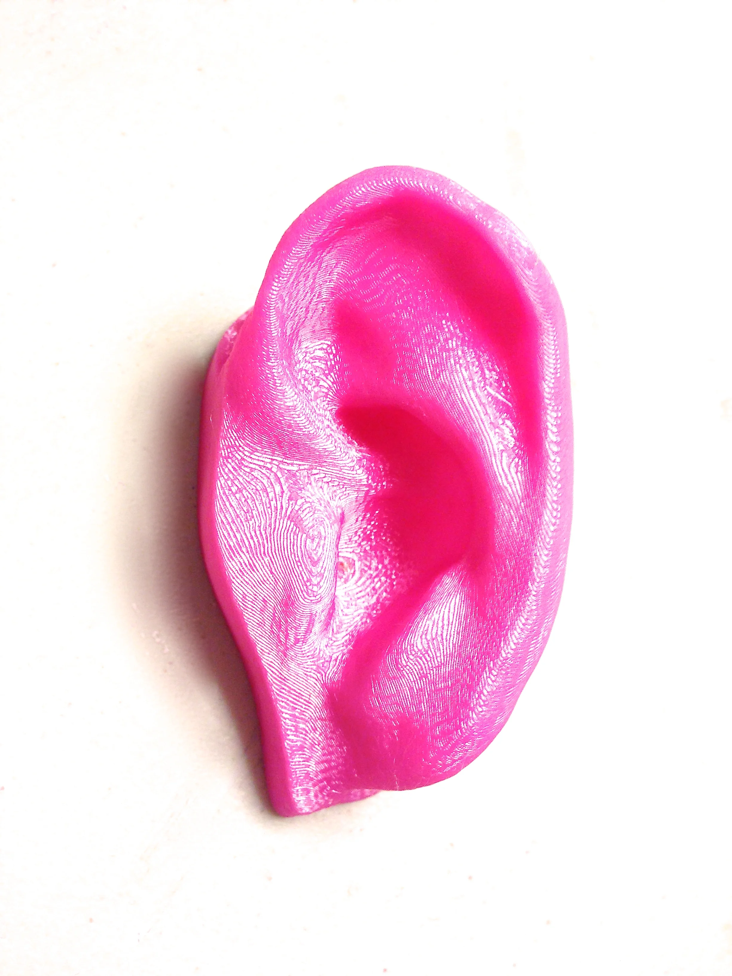 Listen UP! From Thingiverse....an ear, ready to go. I am working on curating an exhibition on invisible disabilities called Invisible: VisAble that will be in Atlanta next April at Mason Murer Gallery. You can be sure you will see many pink ears there! 