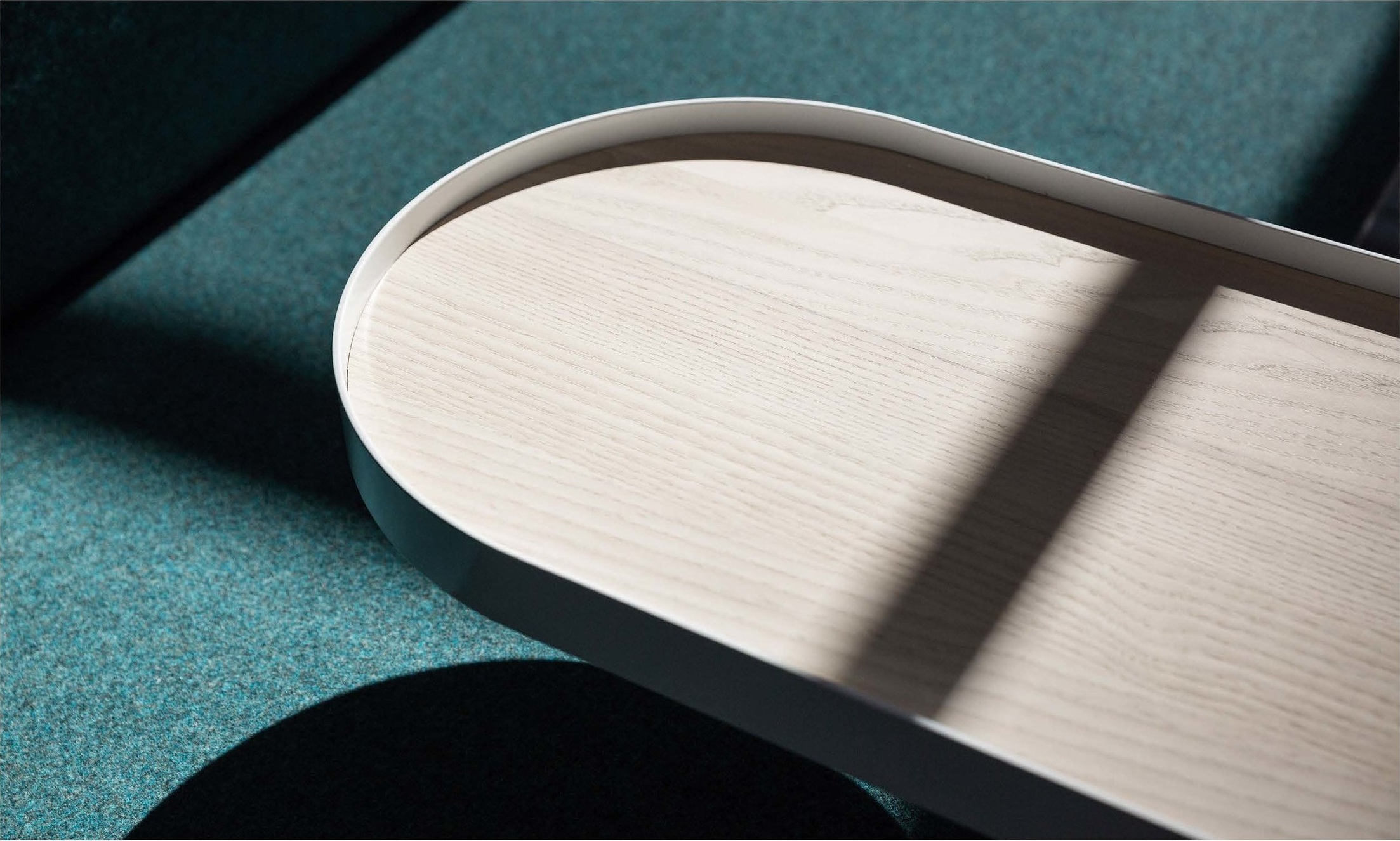 Image via envelopeA+D The material palette of wood, metal, mirror, glass, fabric and concrete, is both simple and beautiful while relying on core design requirements of durability and flexibility.