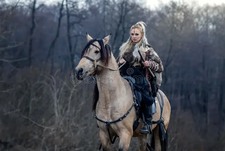 warrior-viking-blonde-female-riding-horse-woods-medieval-movie-scene-focus-rider-warrior-viking-blonde-female-157938217.webp