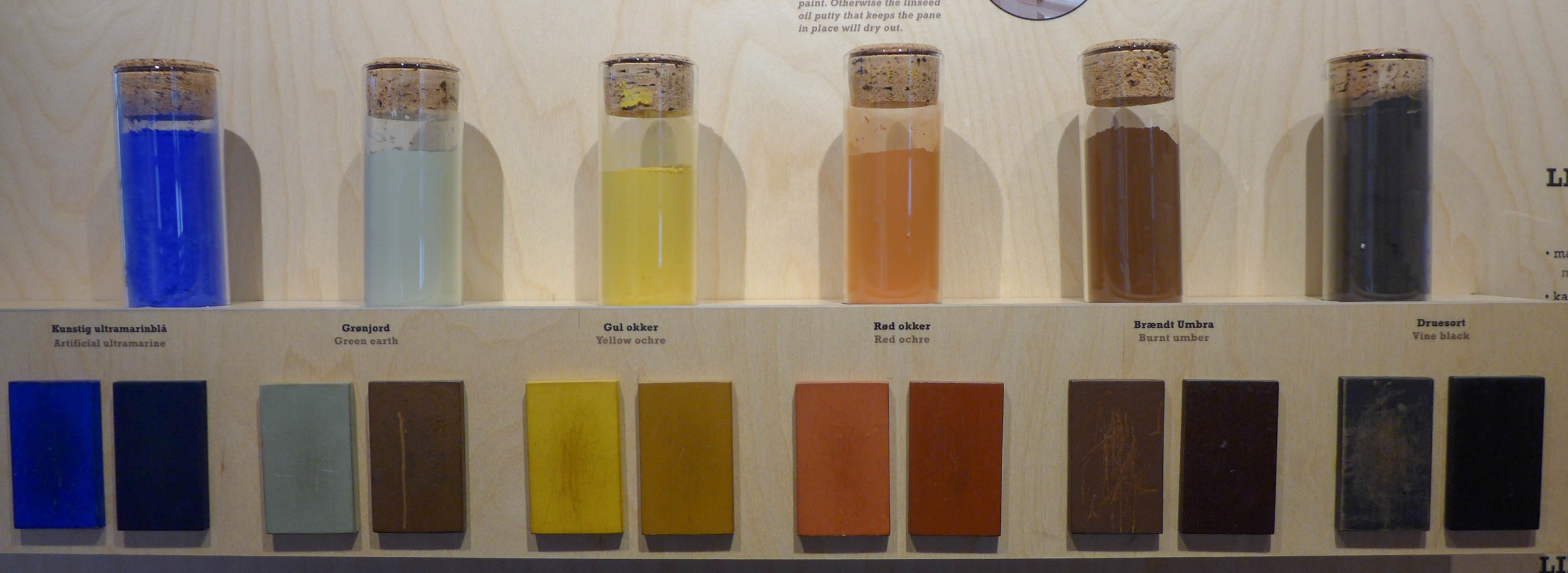 Information at the open air museum, Den Gamle By in Aarhus, about natural pigments used for historic paints
