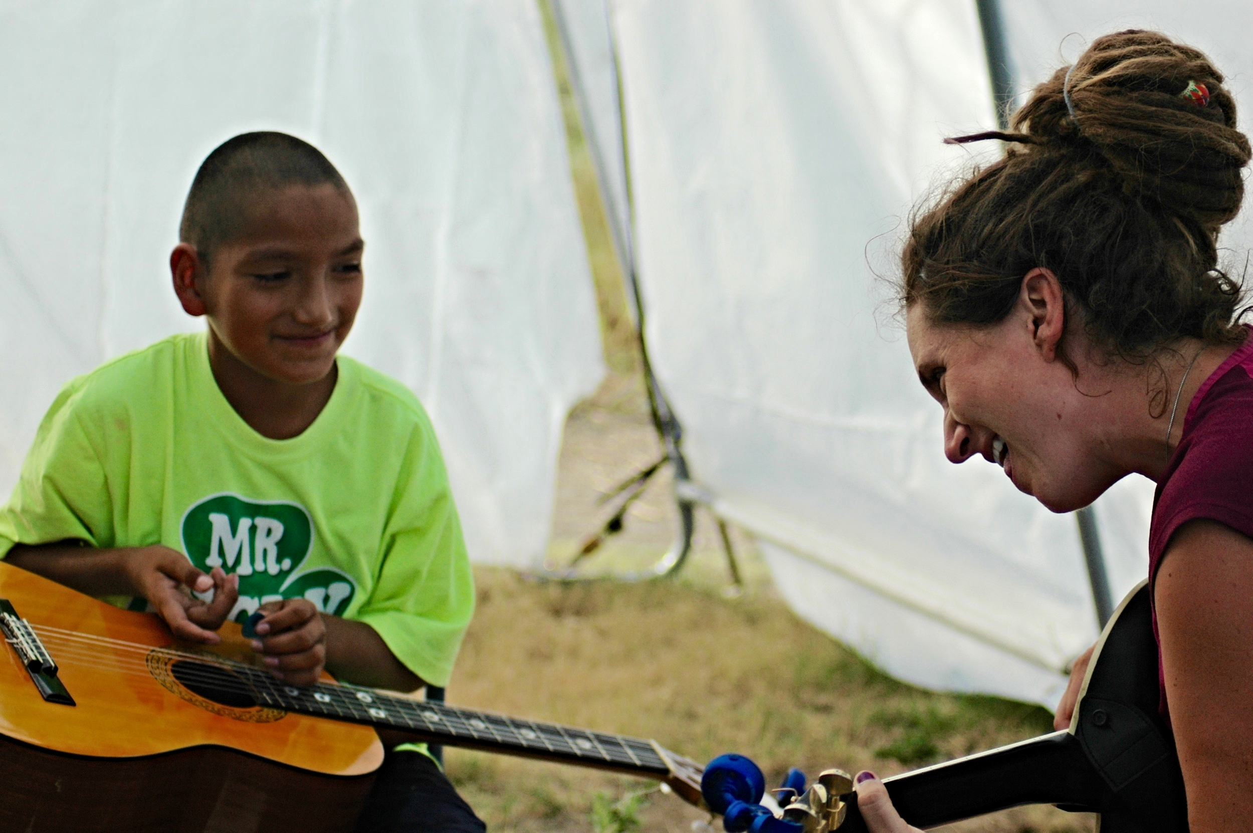 When Kristen is not traveling and performing, she spends her time teaching music camp on the Cheyenne River Reservation with Simply Smiles.