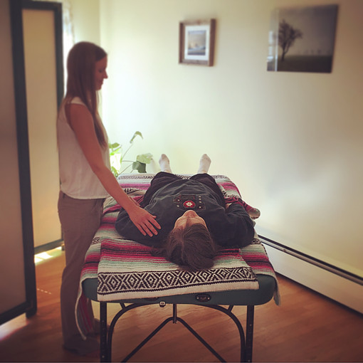 Kaitlin, practicing Reiki. (Photo by K. Clark)