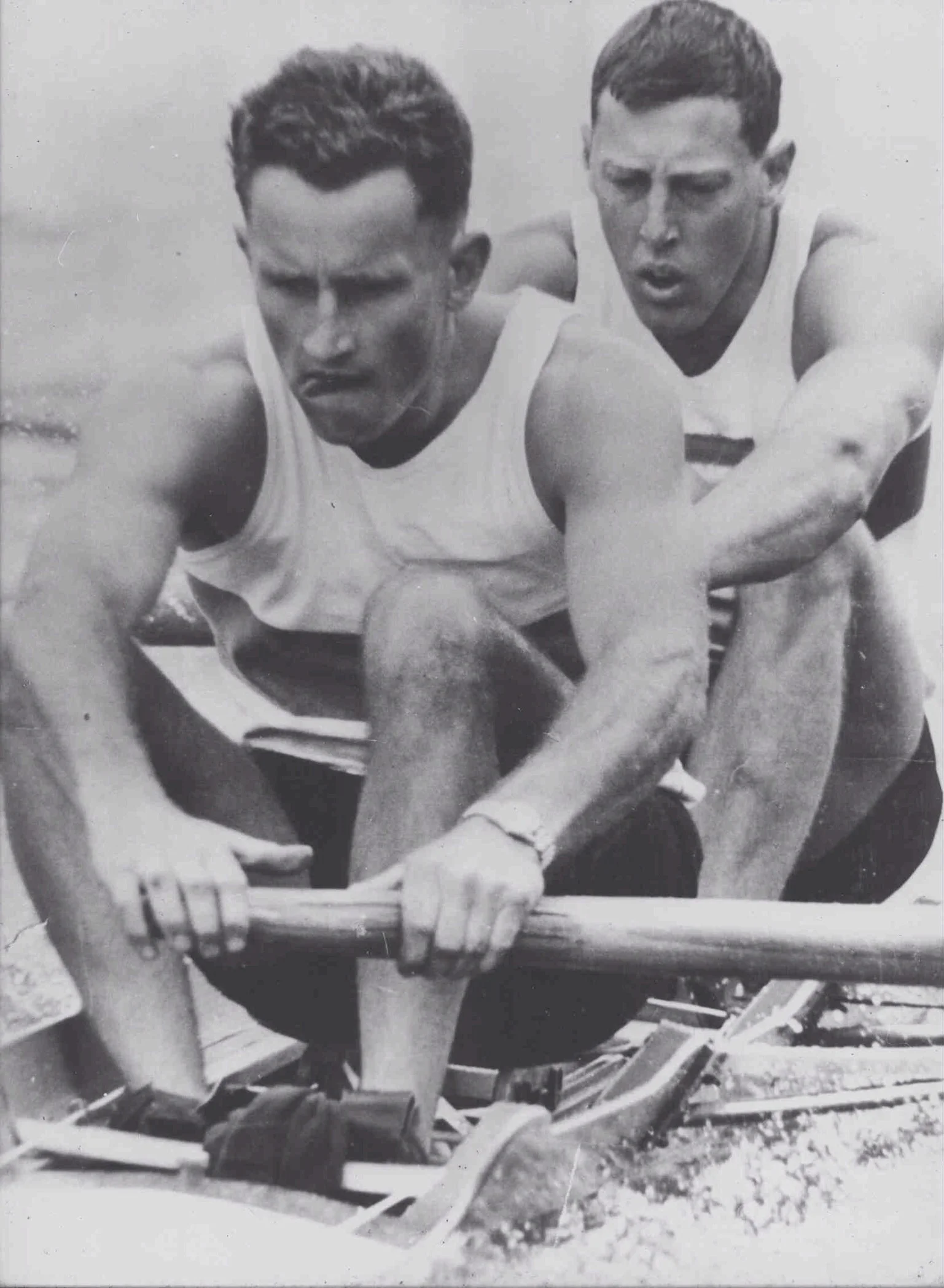 Chic Hammond and Monty McGougan are all concentration competing in a pair oar event.