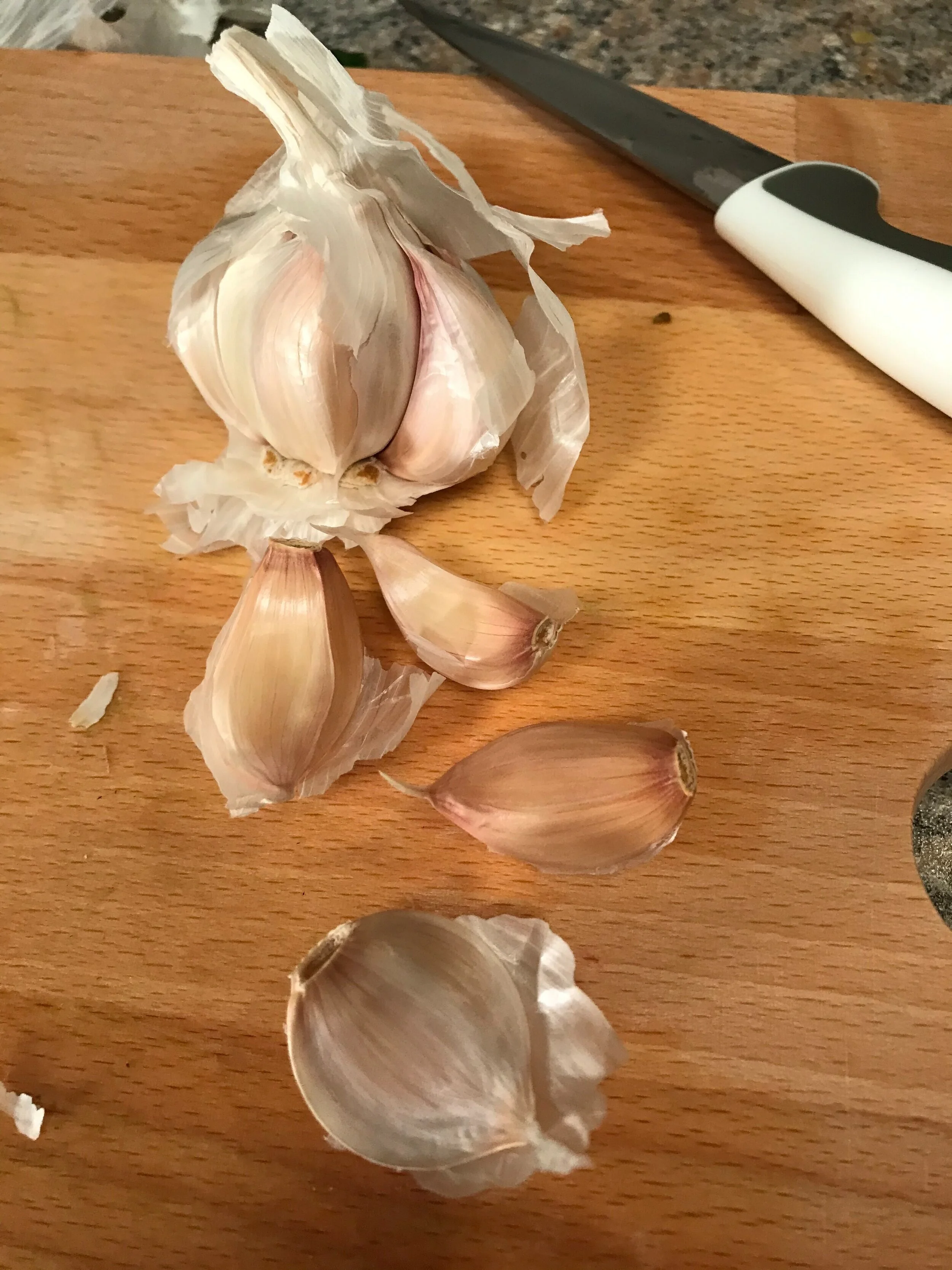 Step 4: Remove 4 cloves from the head of garlic