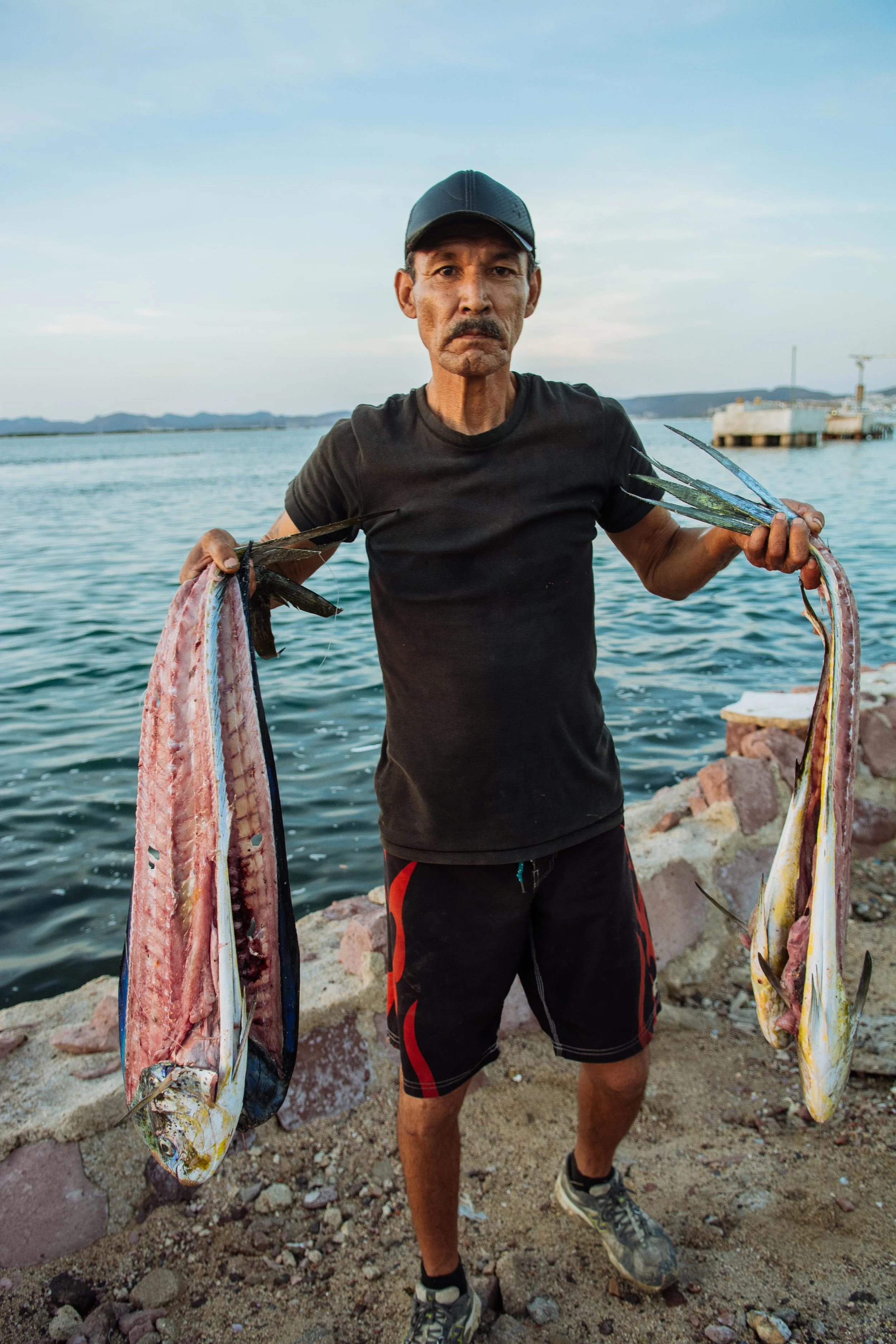 A fisherman in La Paz sells already filleted Mahi Mahi, or Dorado.