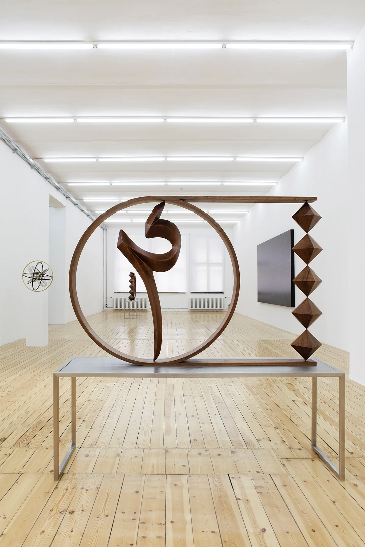   "Unknown Letter I"   2015  wood on steel table  162 x 162 x 42 cm    