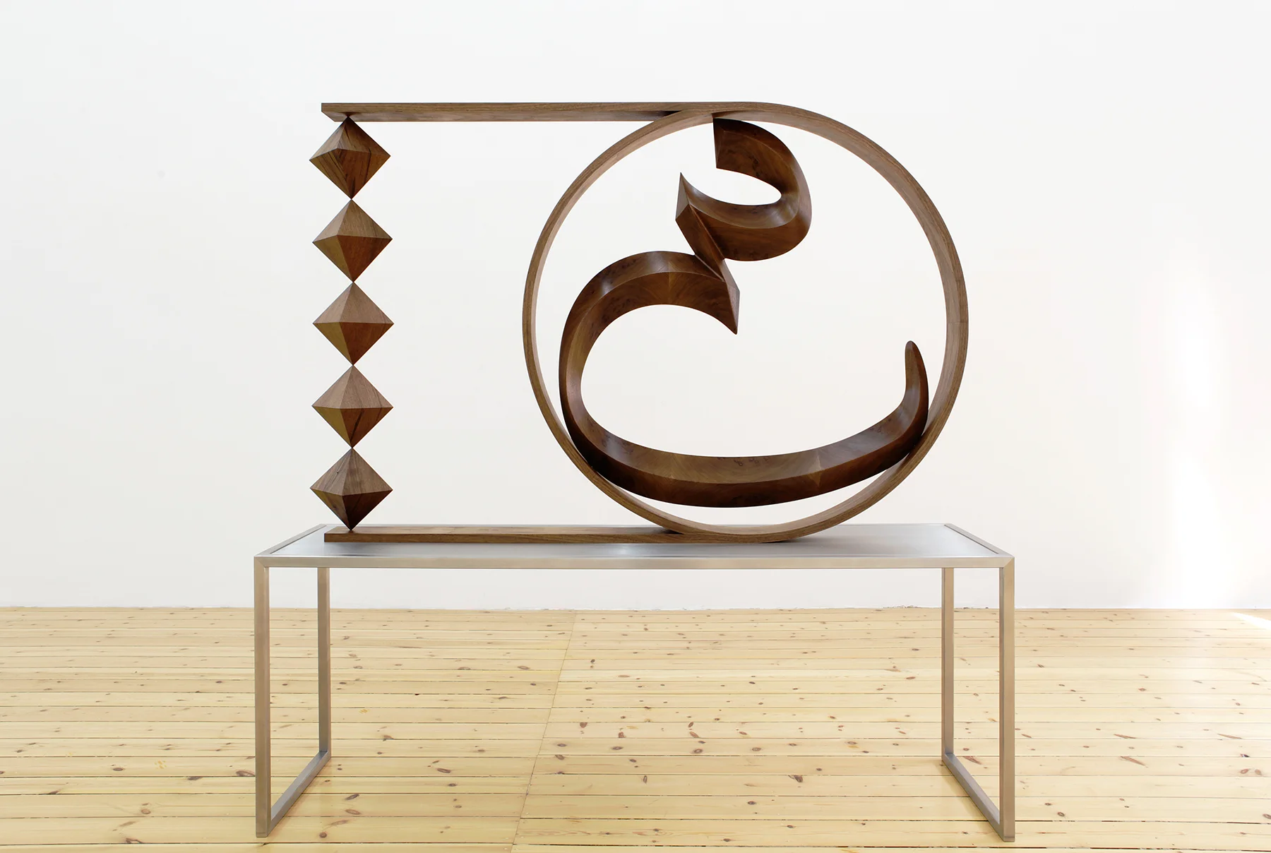   "Unknown Letter I"   2015  wood on steel table  162 x 162 x 42 cm 