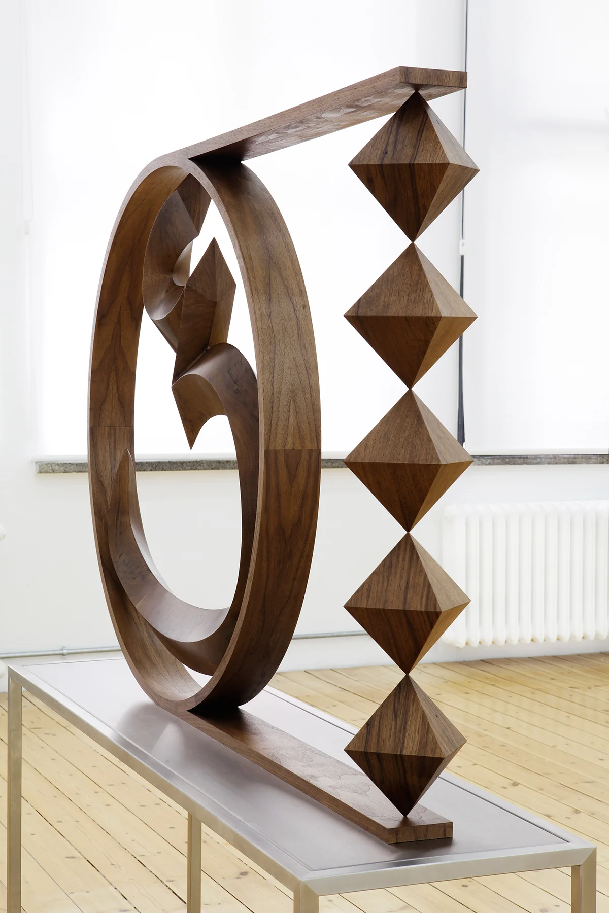   "Unknown Letter II"   2015  wood on steel table  162 x 162 x 42 cm 