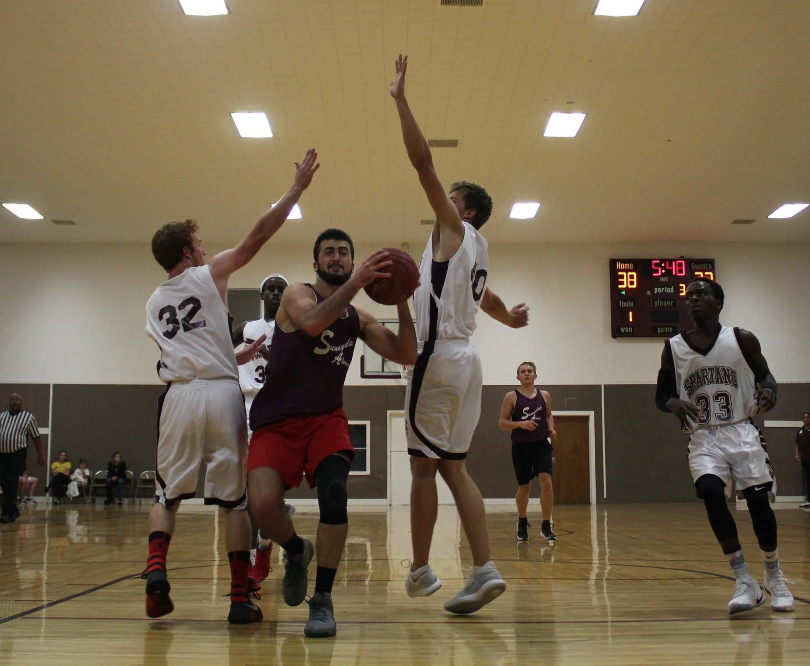 Logan (‘17) splits the defense
