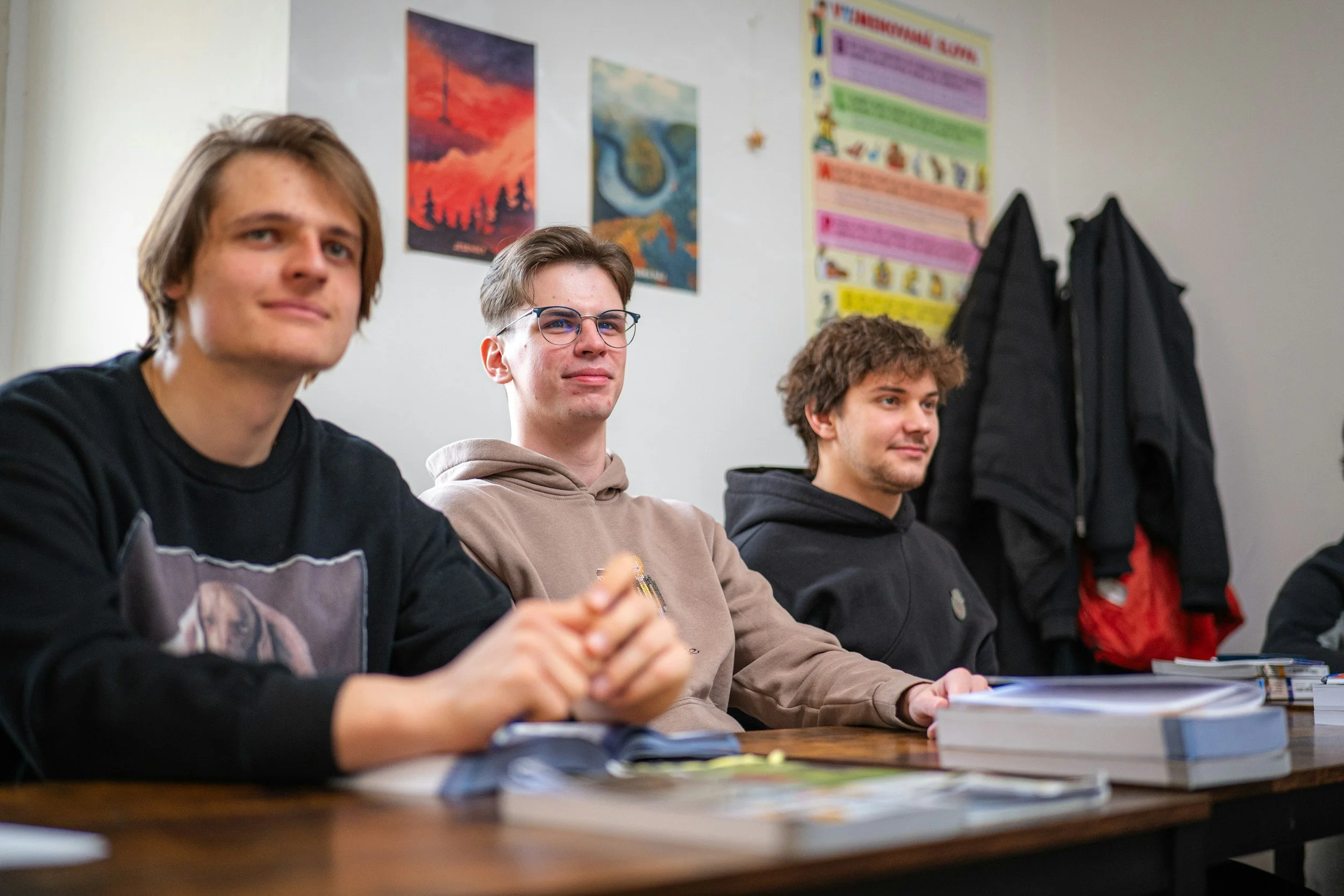 Three guys in a classroom