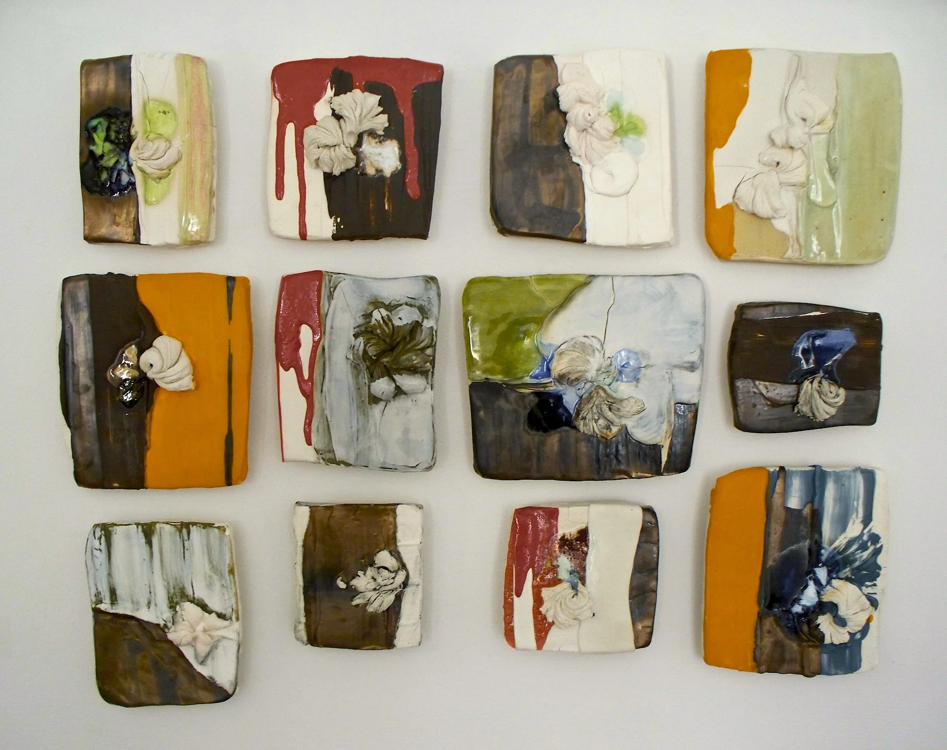 Pieced Sampler: ‘new appliqué’, stoneware, porcelain, colored slips, glazes, glass, oxides 36” x 20” (dimensions variable), 2009