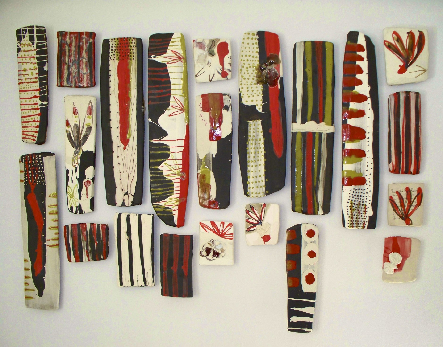 Block and Strips: ‘selection and choice, found and realized, mine and yours - № 1’ stoneware, black clay, porcelain, glass, glaze, cone 6 oxidation, 6’ x 4’ (dimensions variable), 2009