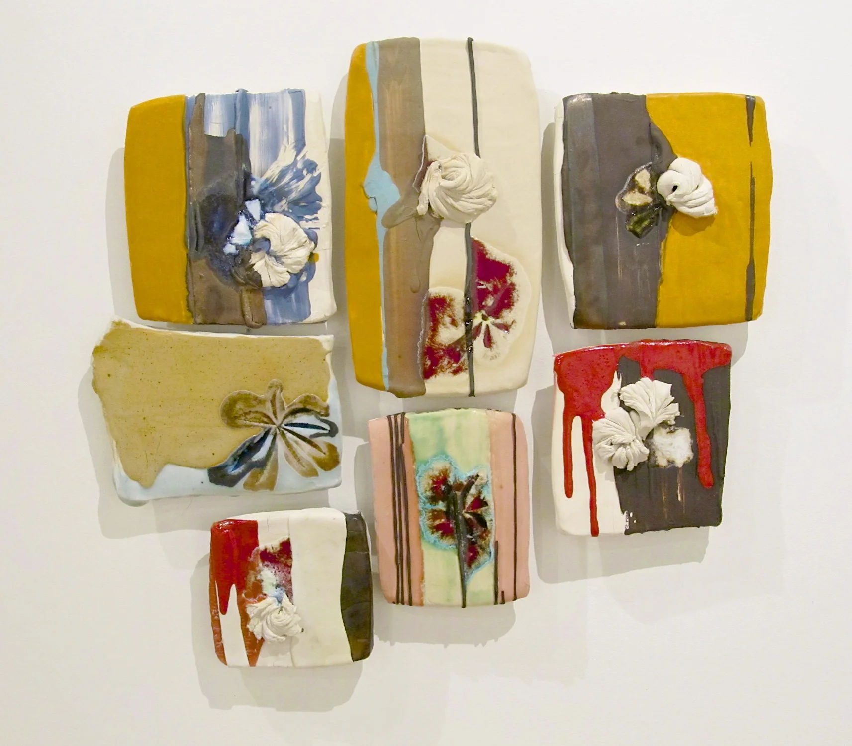 Pieced Sampler: ‘saved appliquè’, 18" x 20" (dimensions variable), porcelain, glass, colored slip, glaze, black clay, 2012