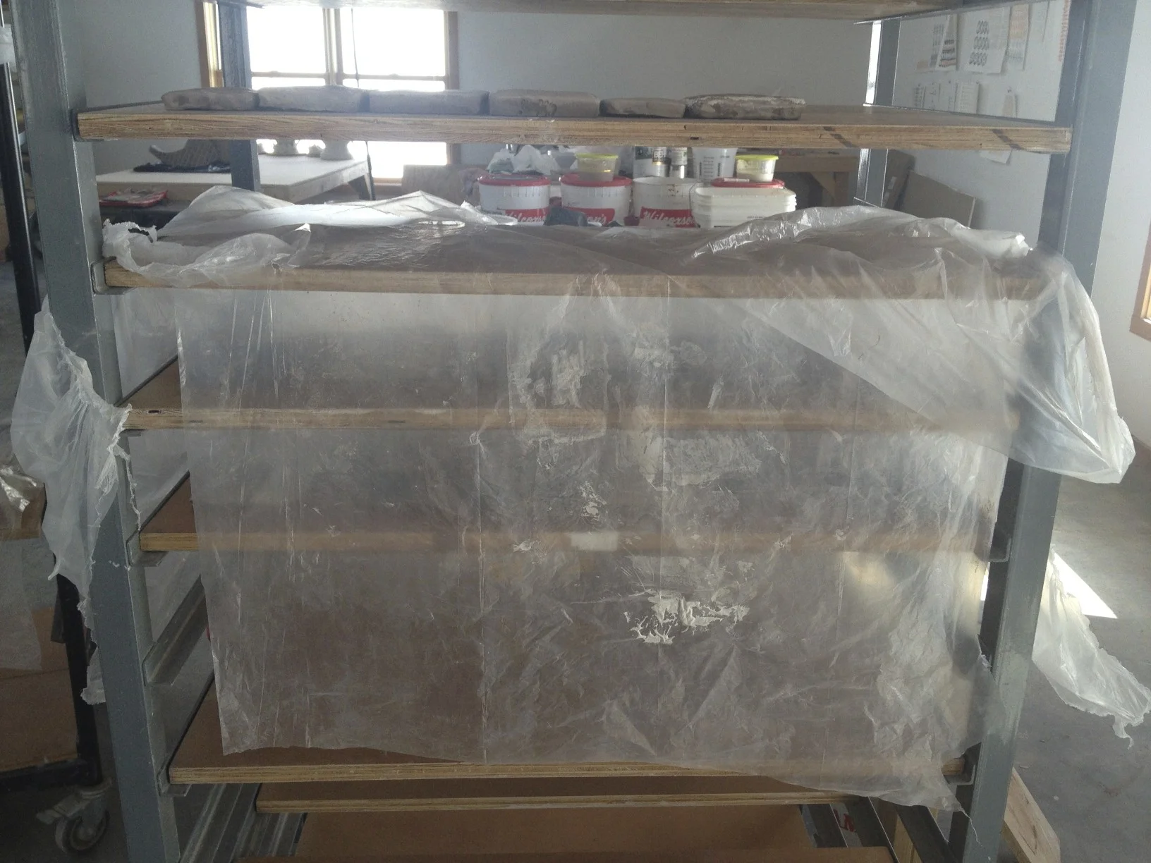 tiles drying slowing on rack....