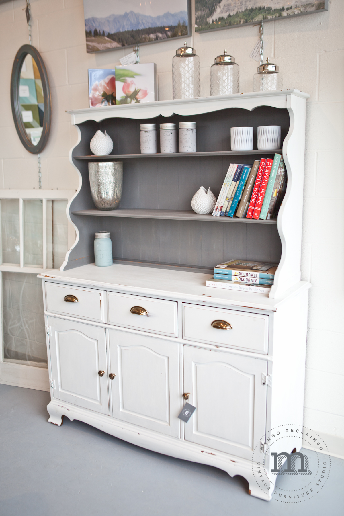 Painted in Miss Mustard Seed's Milk Paint 'Ironstone' and 'Trophy'. This hutch is currently available for $895.