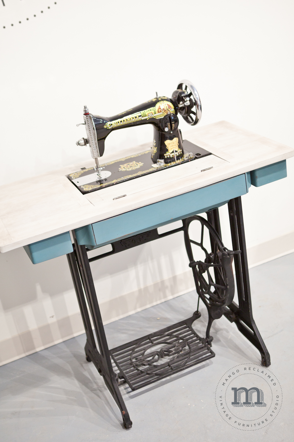 The sewing machine sitting on the table is a great conversation piece and can be tucked away discreetly when the table top is needed for entertaining. A beautiful piece that is truly multi-functional AND holds great sentimental value.