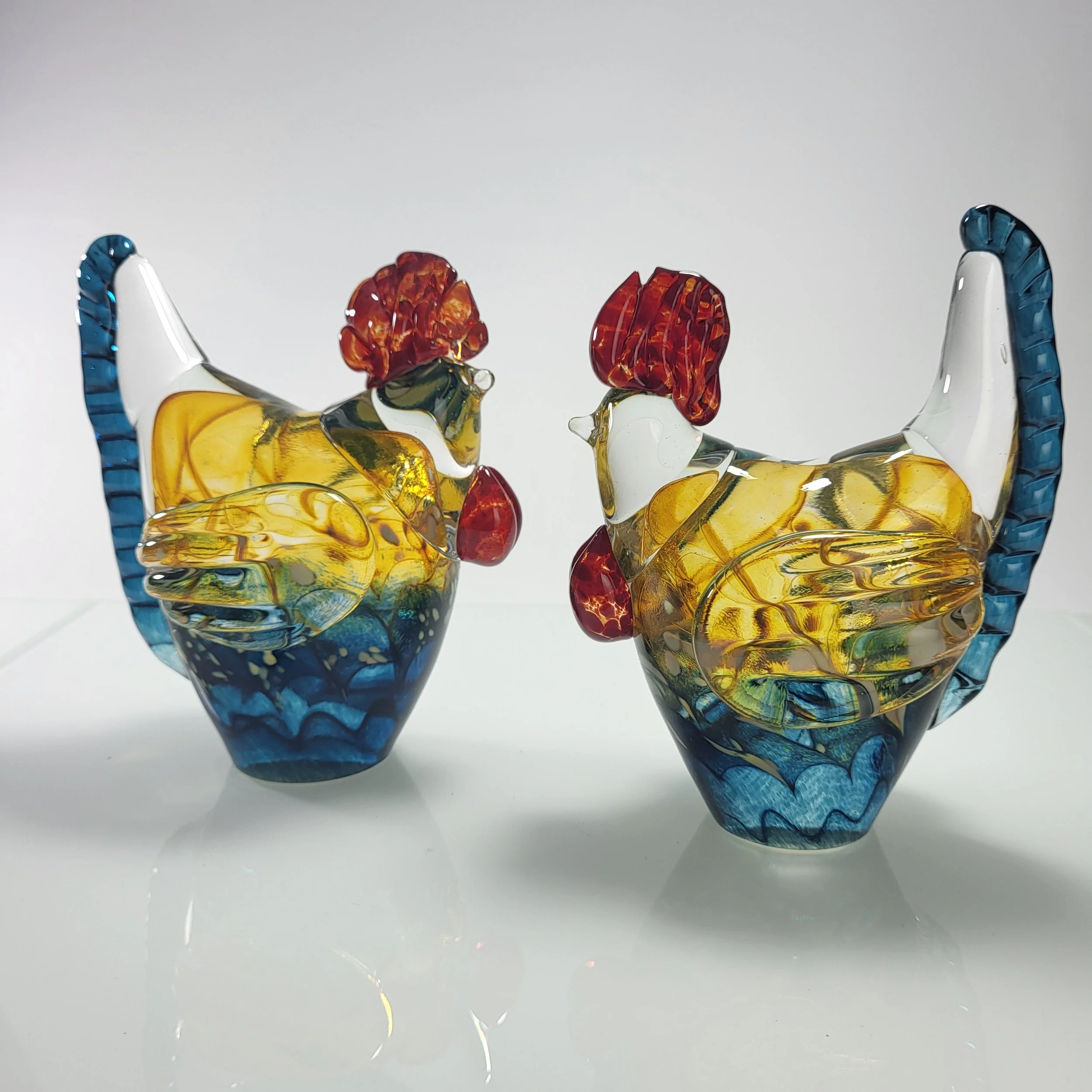 "Roosters", sculpted glass