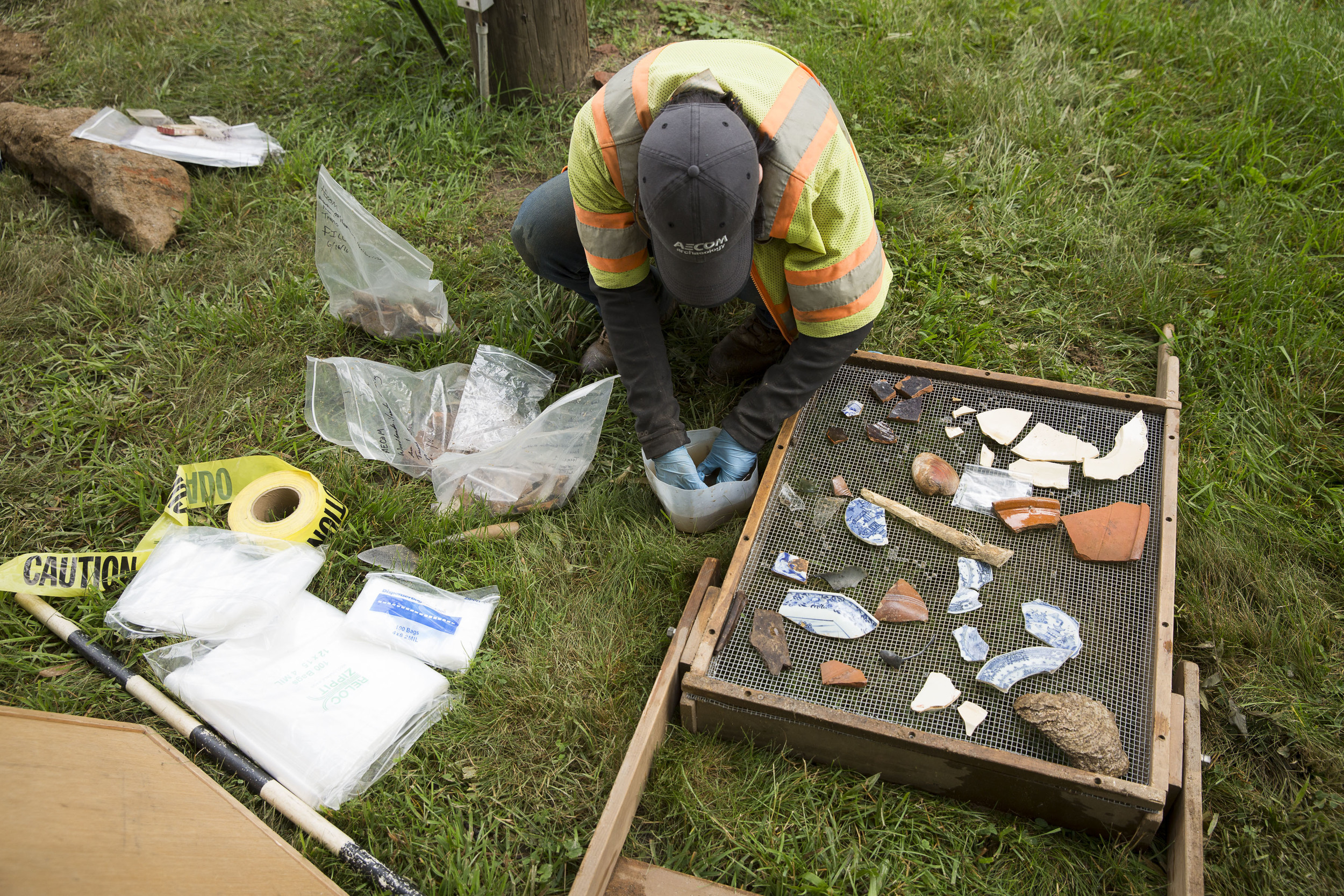 Kim sorts and washes artifacts found during the dig. Photo: Ryan Collerd