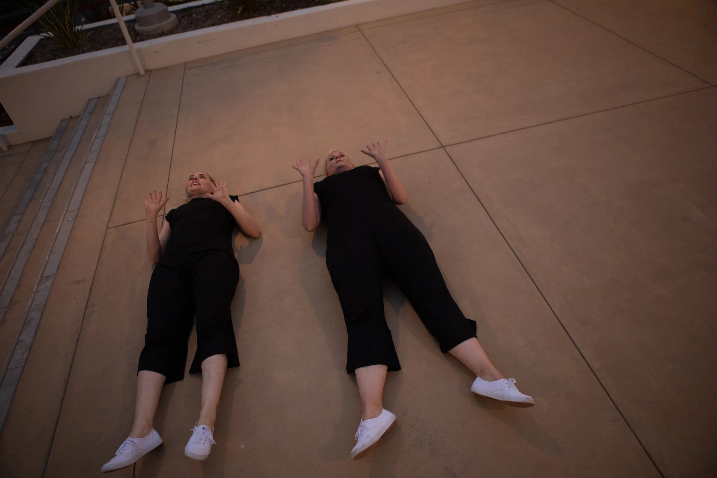 jess and liz laying down - brand library.jpg